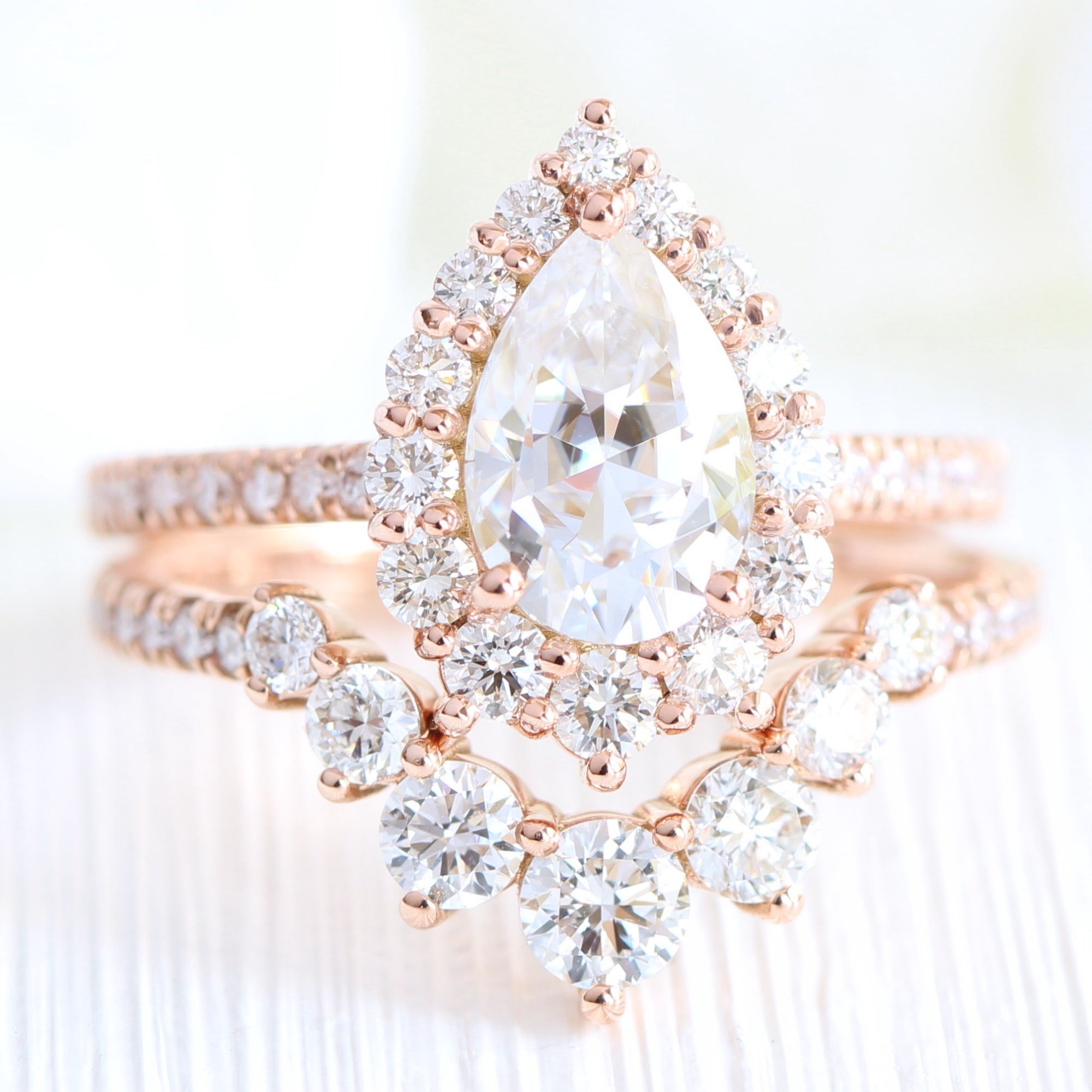 Halo diamond pear moissanite ring rose gold deep curved diamond wedding ring stack la more design jewelry