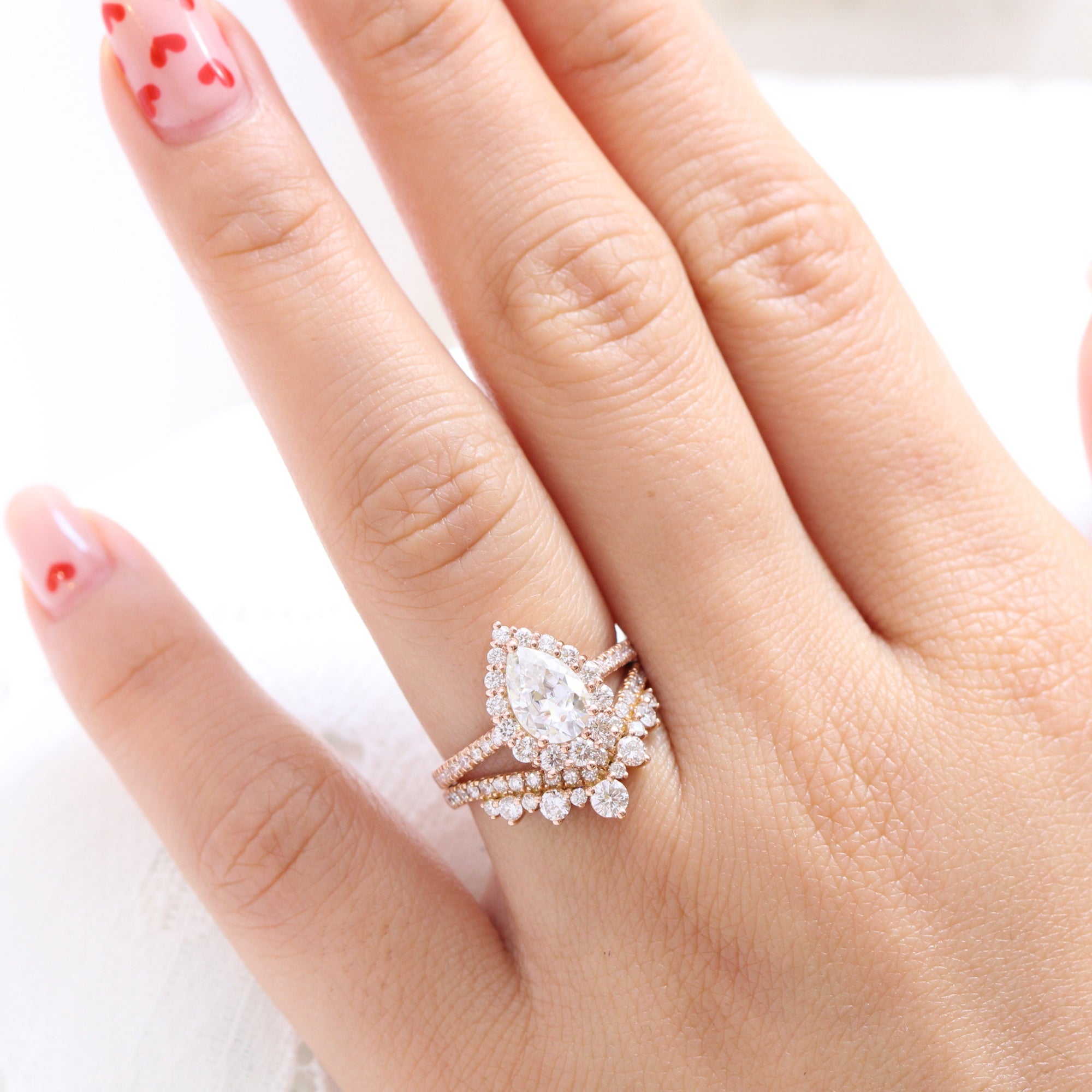 Halo diamond pear moissanite ring rose gold v shape diamond wedding ring stack la more design jewelry