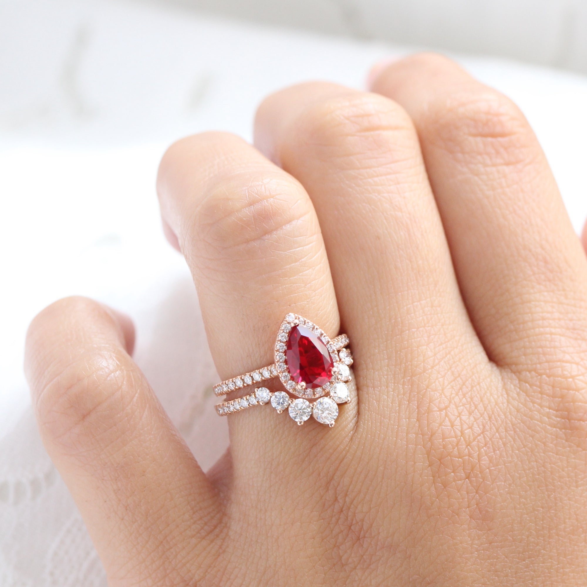Halo diamond pear ruby ring stack rose gold deep curved diamond wedding band la more design jewelry