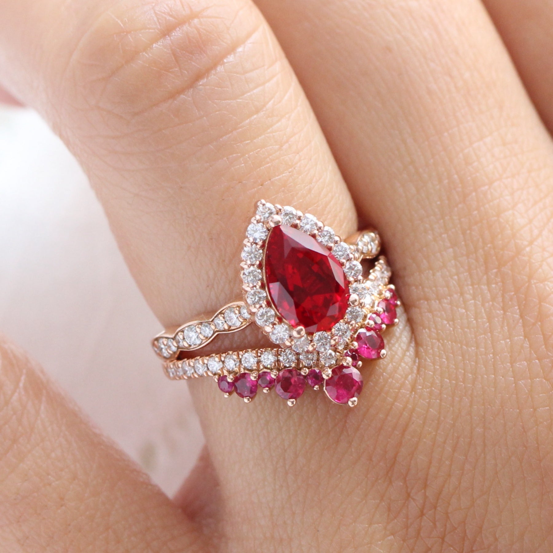 Halo diamond pear ruby ring stack rose gold deep curved wedding band bridal set la more design jewelry