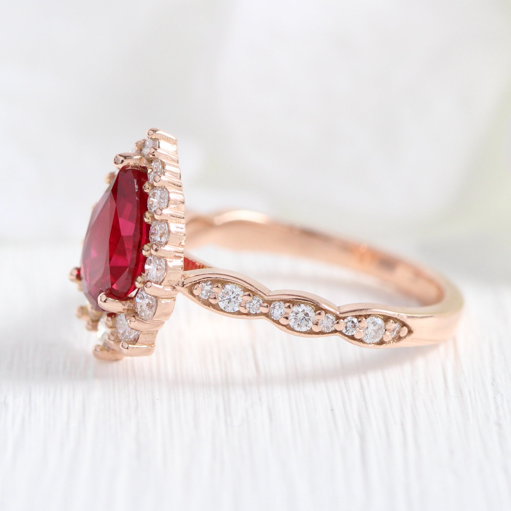 Large pear ruby engagement ring rose gold halo diamond ruby ring la more design jewelry