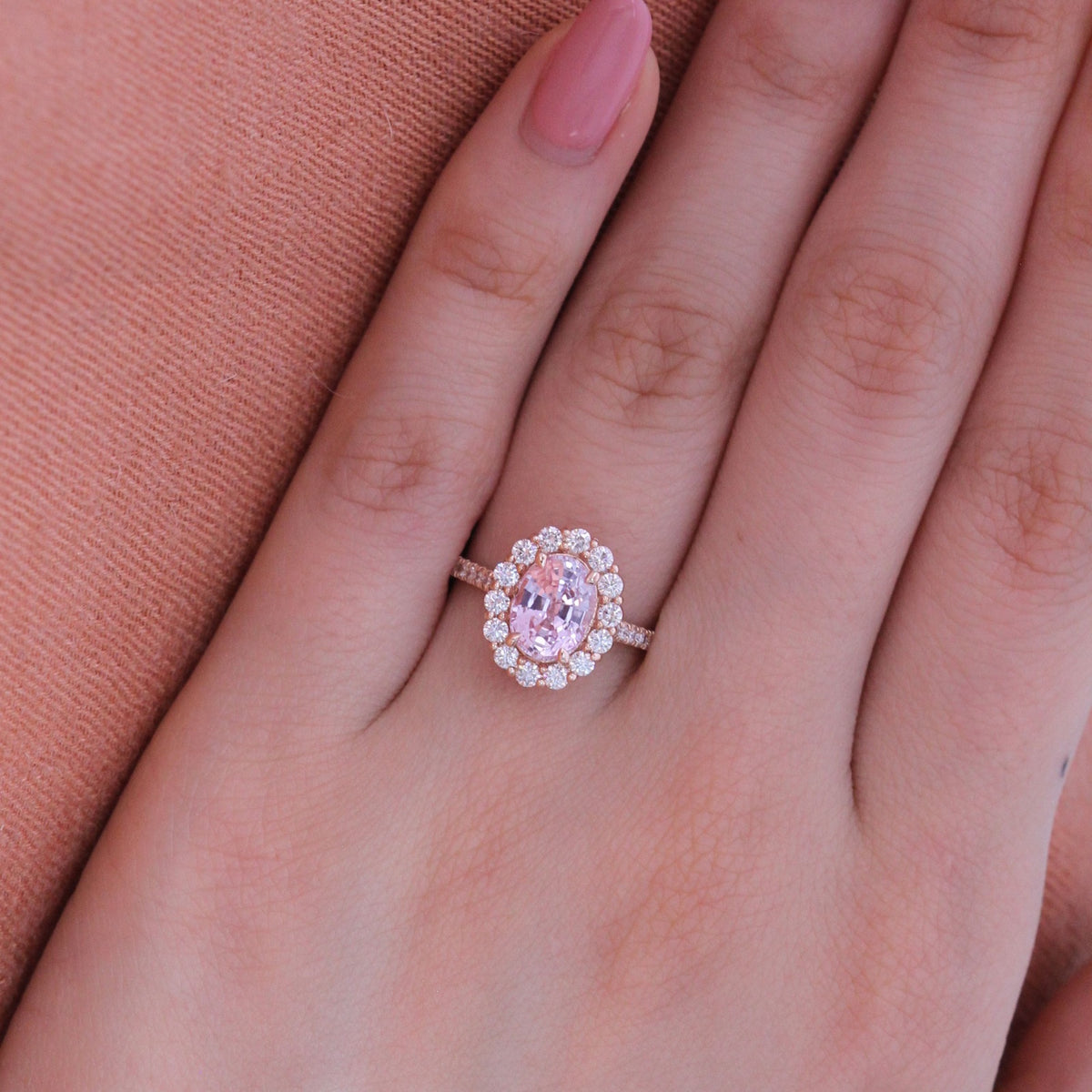 Natural pastel pink sapphire engagement ring in 14k rose gold by la more design
