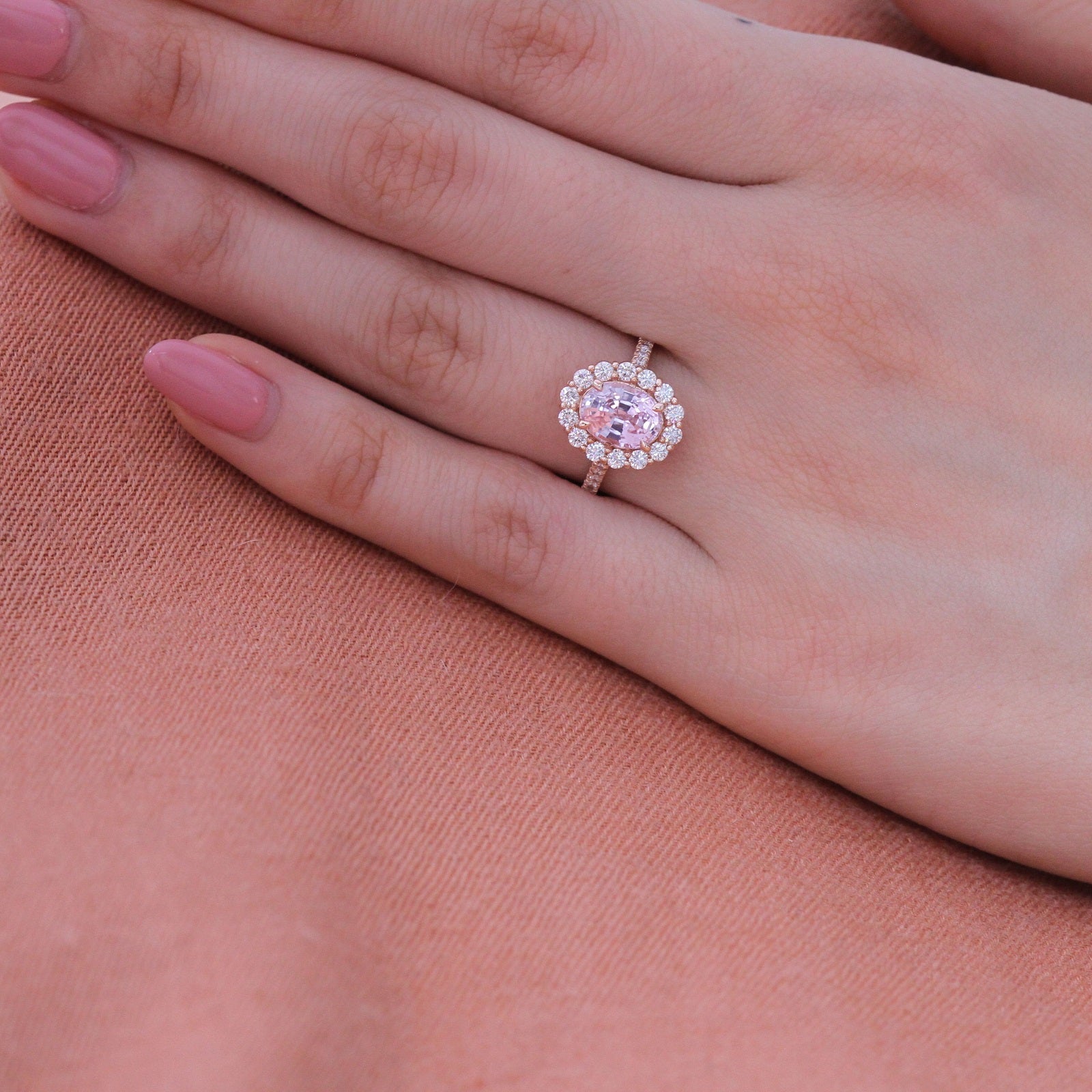Natural pastel pink sapphire engagement ring in 14k rose gold by la more design