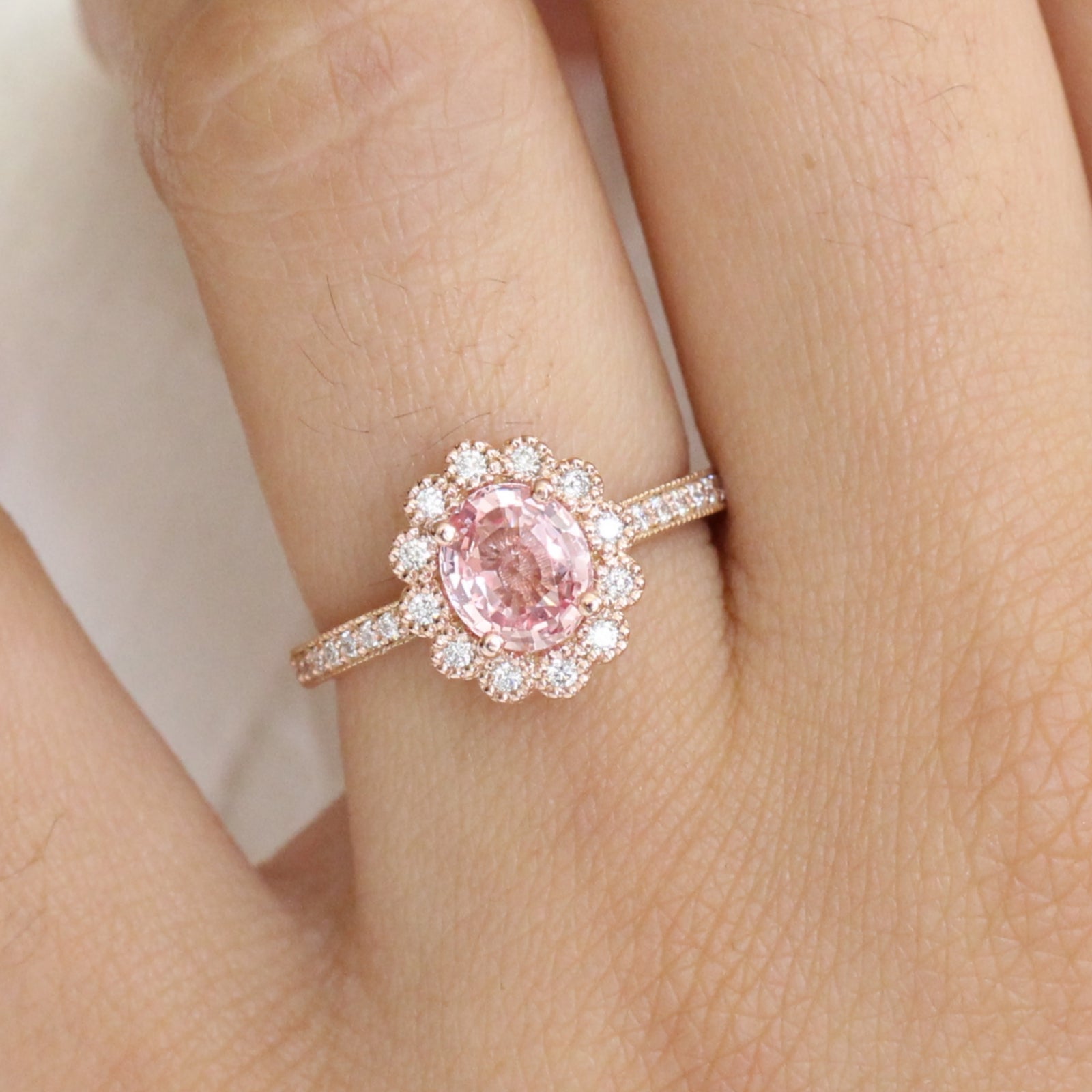 Oval Peach Sapphire Engagement Ring in Rose Gold Halo Diamond Band by La More Design Jewelry