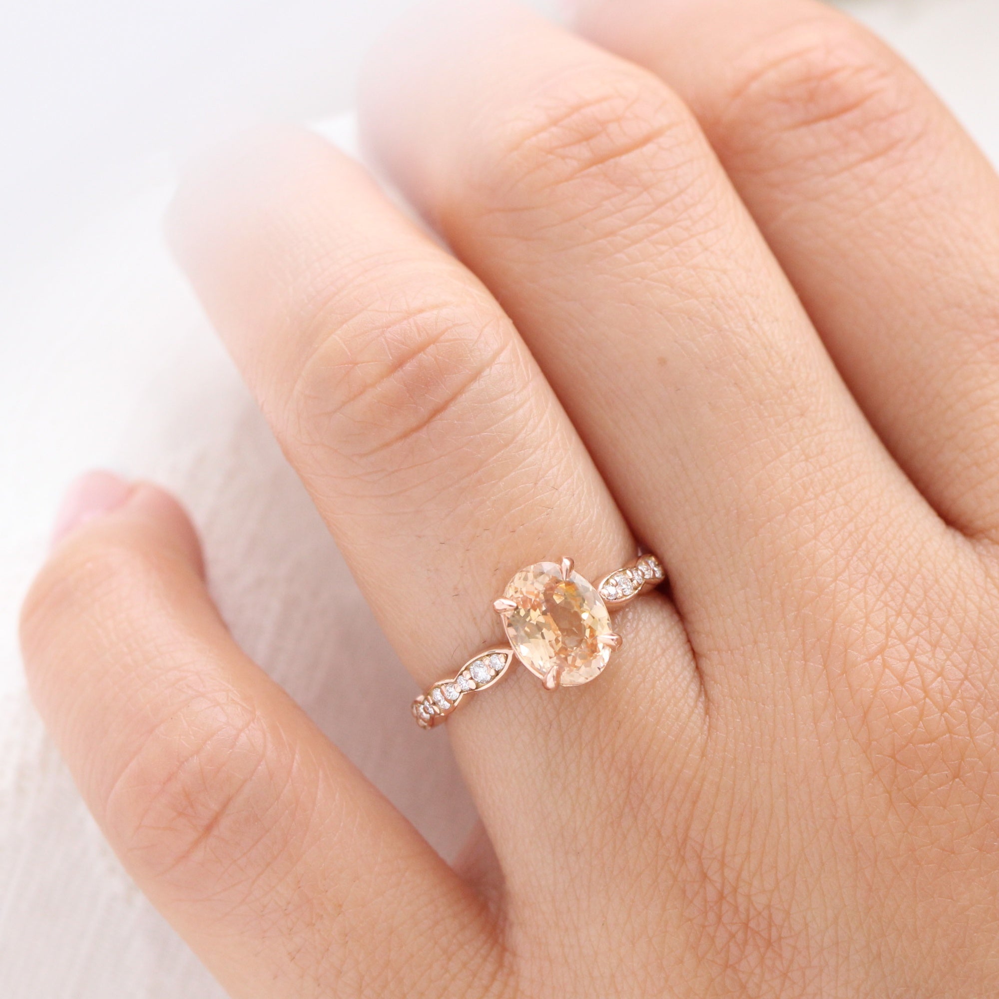 Oval peach sapphire ring rose gold diamond band low set engagement ring la more design jewelry