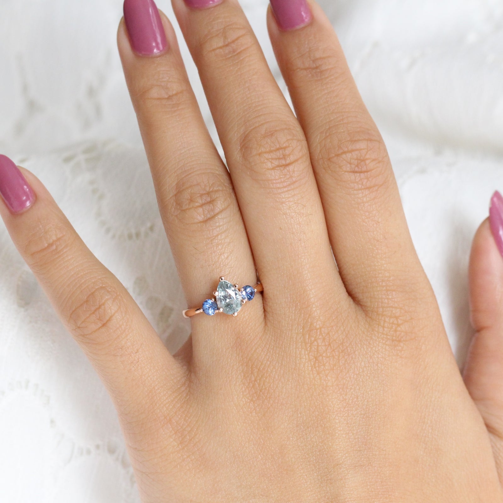 Pear Aqua Blue Sapphire Engagement Ring in Rose Gold 3 Stone Ring by La More Design Jewelry