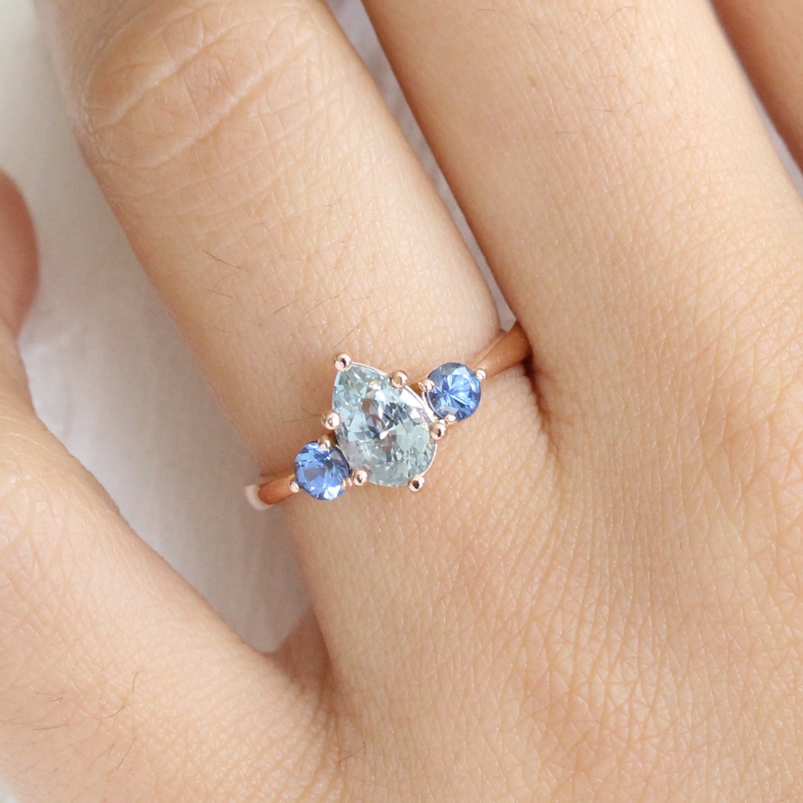Pear Aqua Blue Sapphire Engagement Ring in Rose Gold 3 Stone Ring by La More Design Jewelry