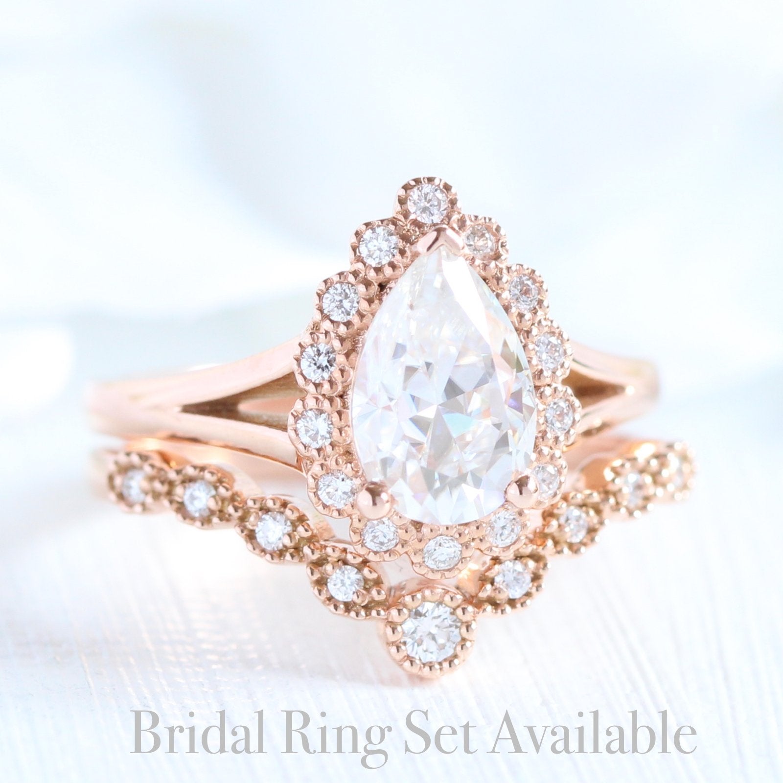 Pear moissanite ring bridal set in rose gold vintage inspired diamond band by la more design