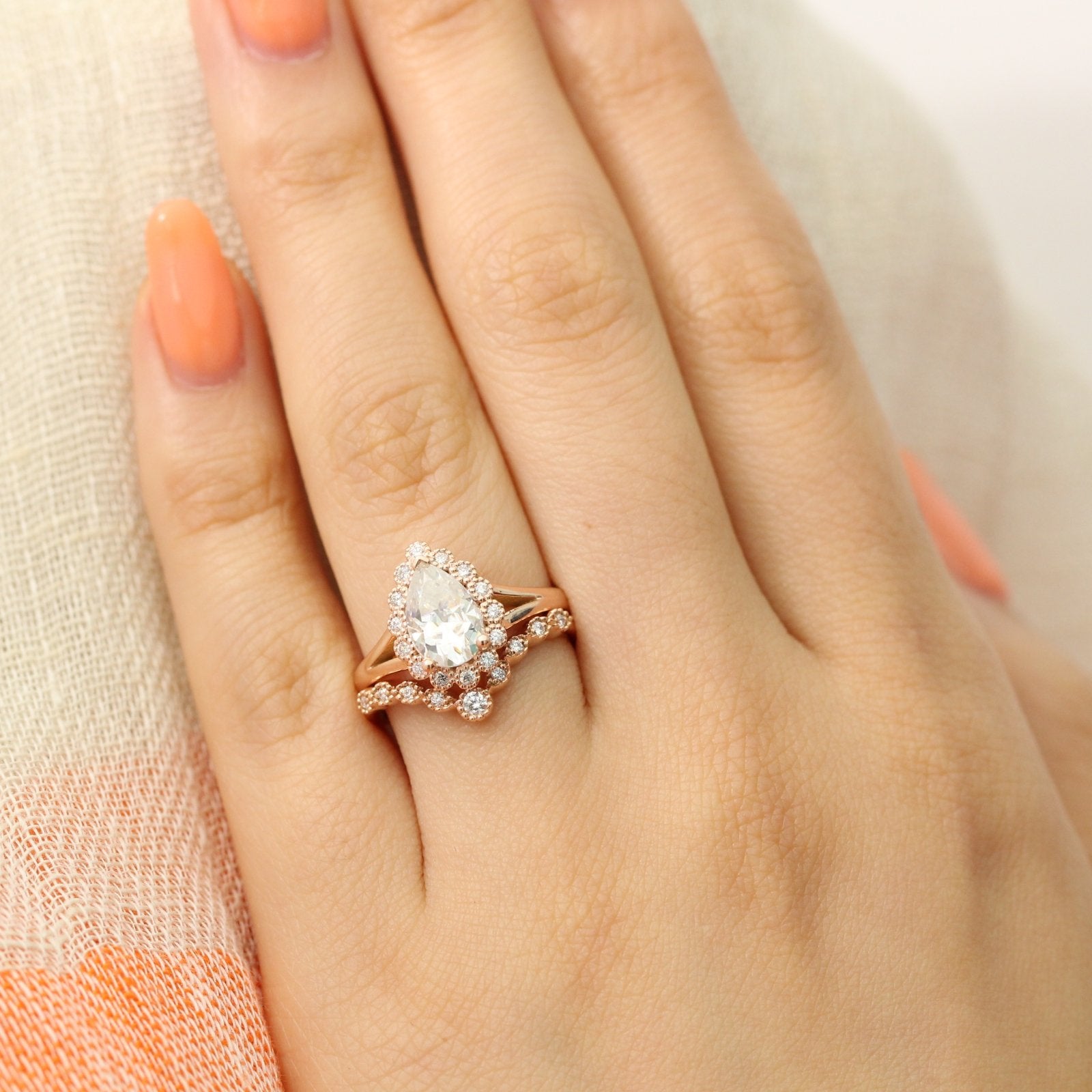 Pear moissanite ring bridal set in rose gold vintage inspired diamond band by la more design