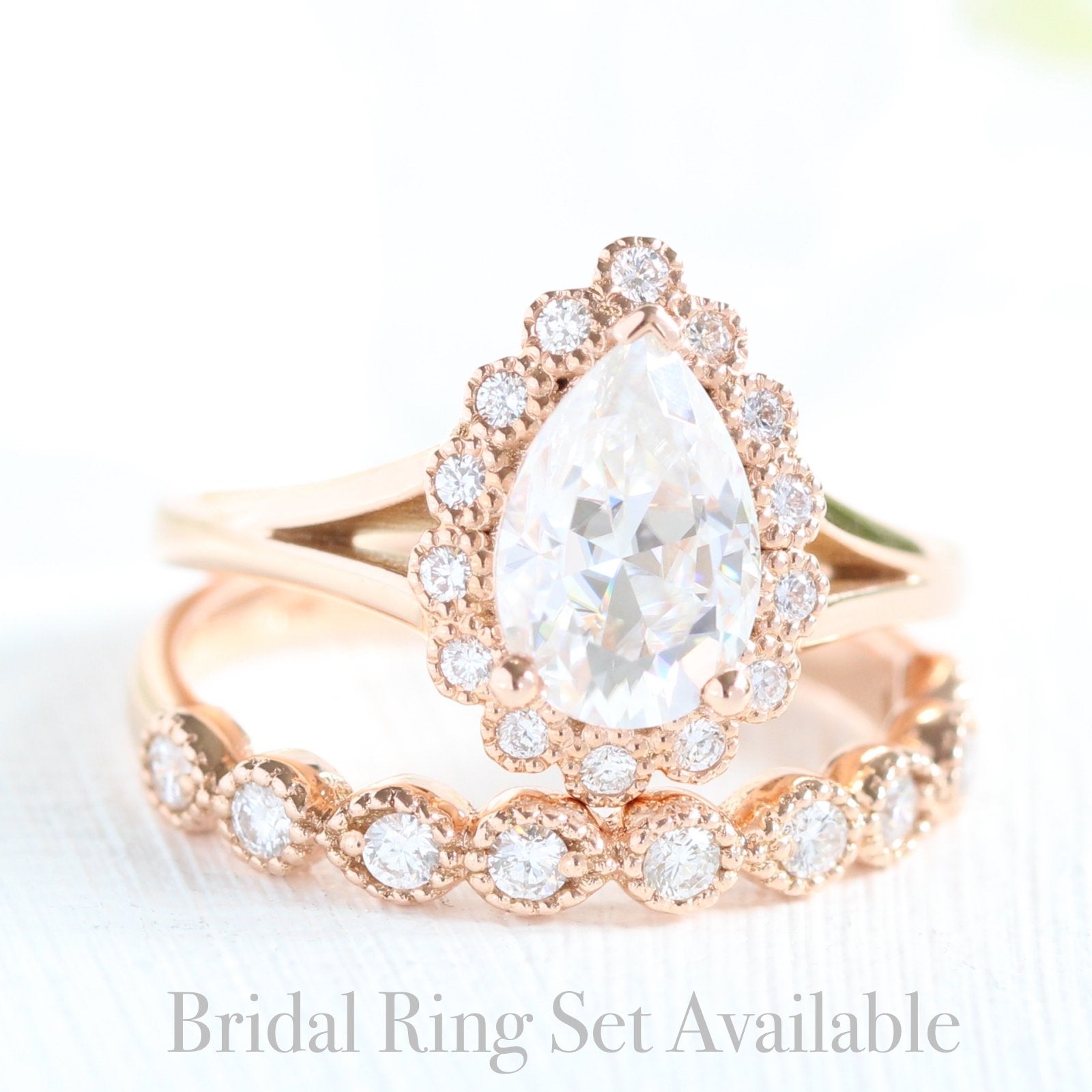Pear moissanite ring bridal set in rose gold vintage inspired diamond band by la more design