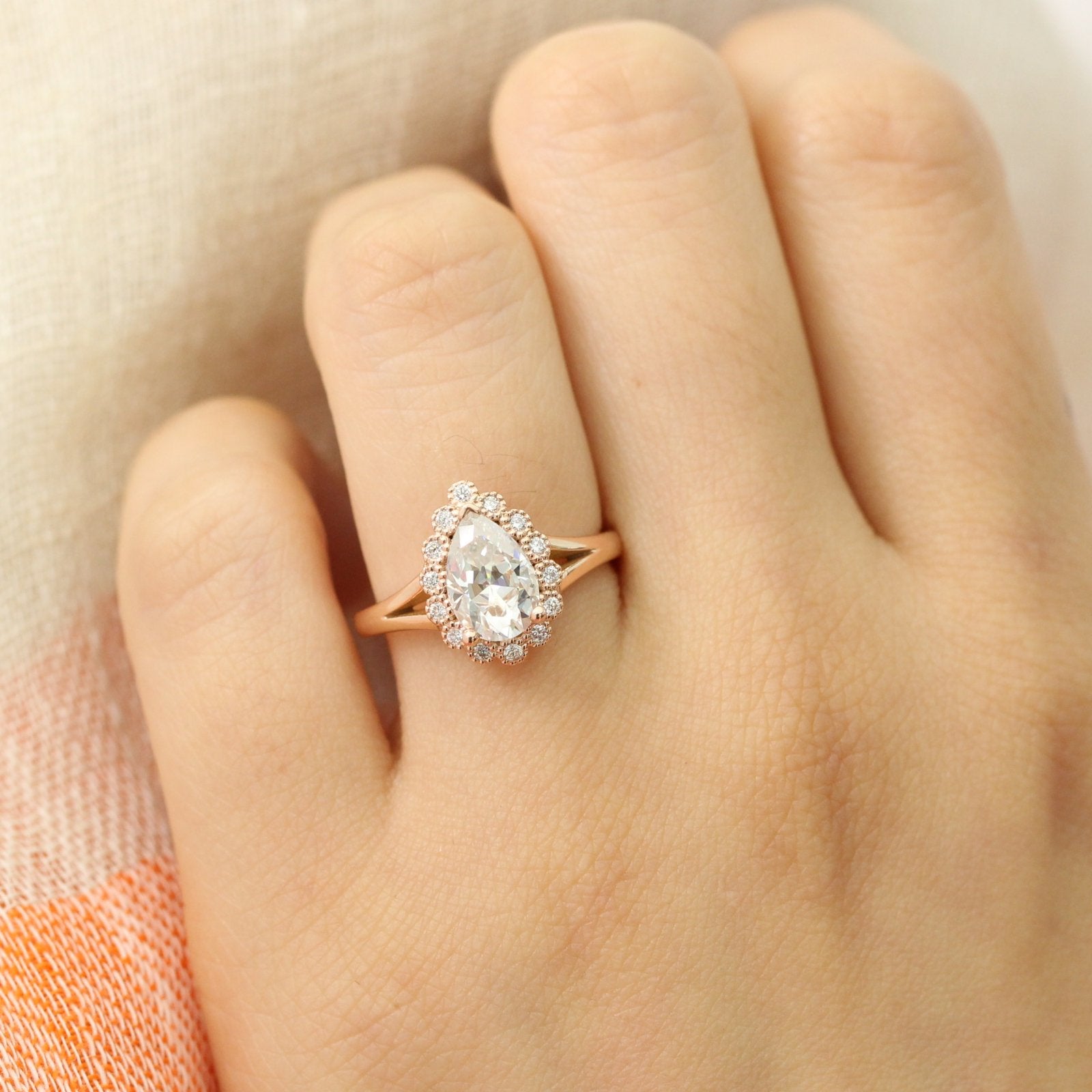 Pear forever one moissanite ring in rose gold vintage halo diamond band by la more design