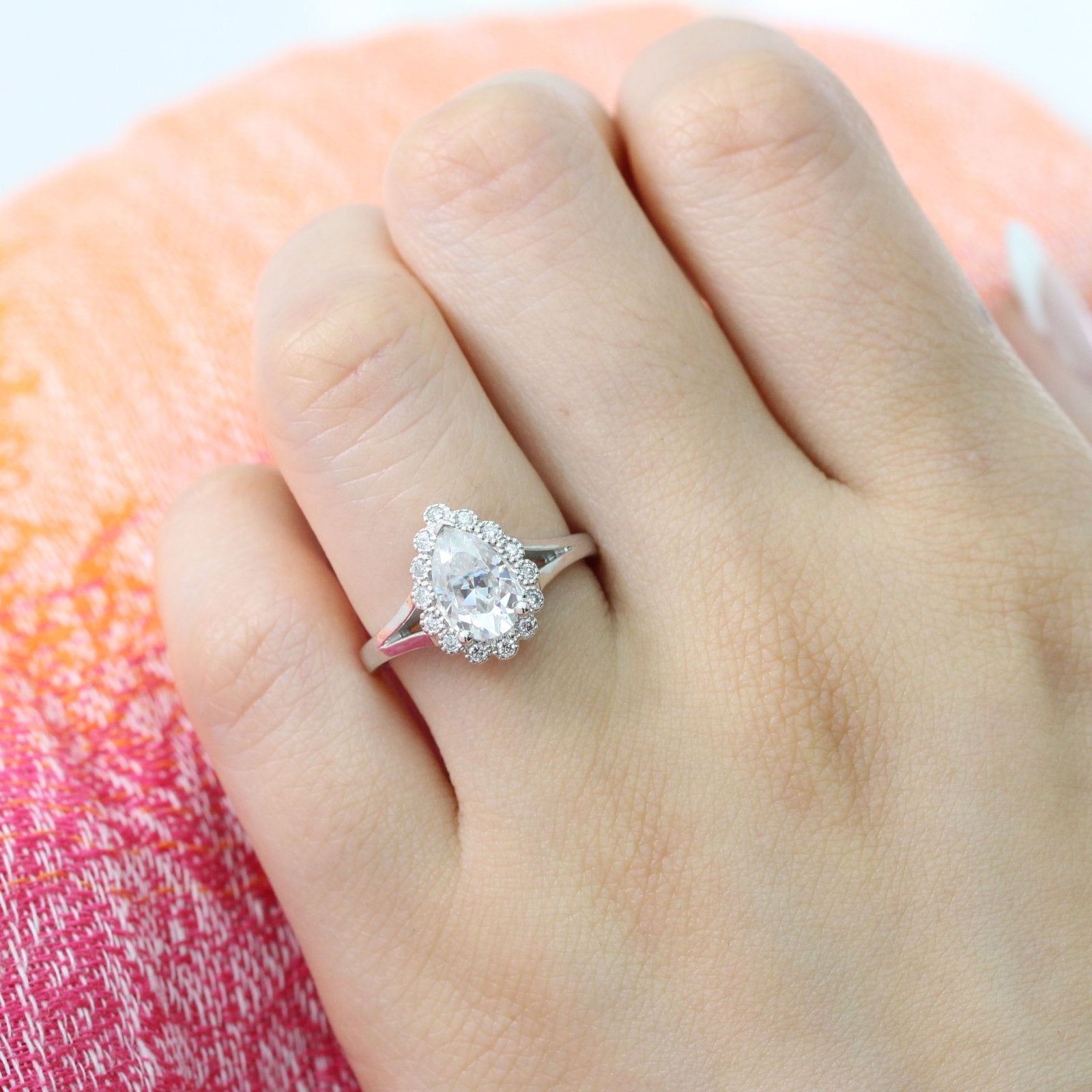 Pear moissanite engagement ring in white gold vintage inspired diamond band by la more design