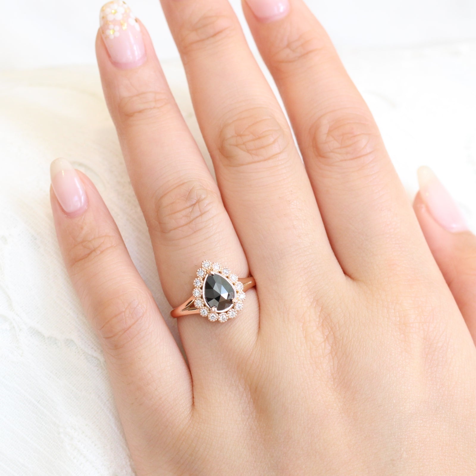 pear rose cut black diamond engagement ring in rose gold halo diamond by la more design