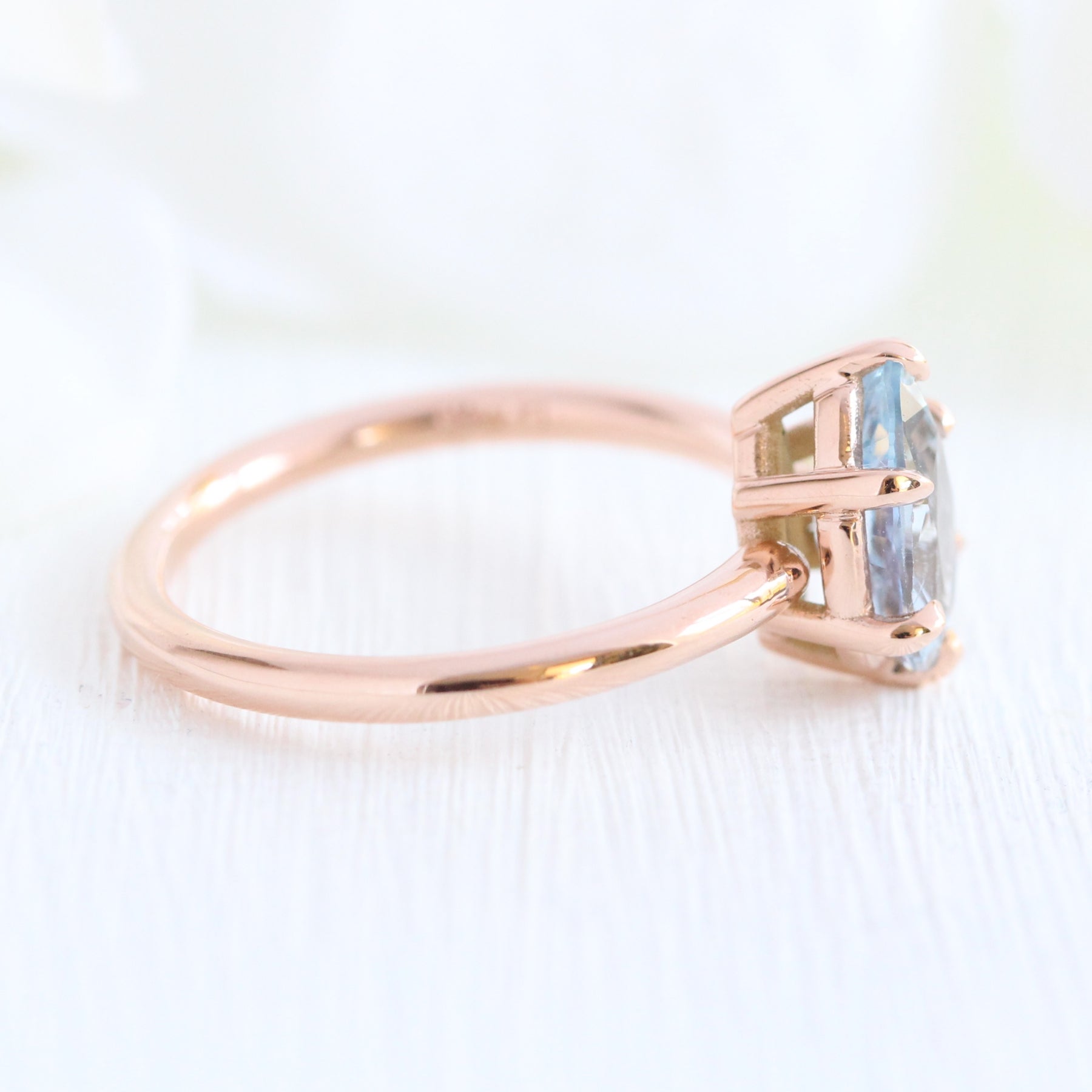 Pear aqua blue sapphire engagement ring rose gold low profile solitaire ring la more design jewelry
