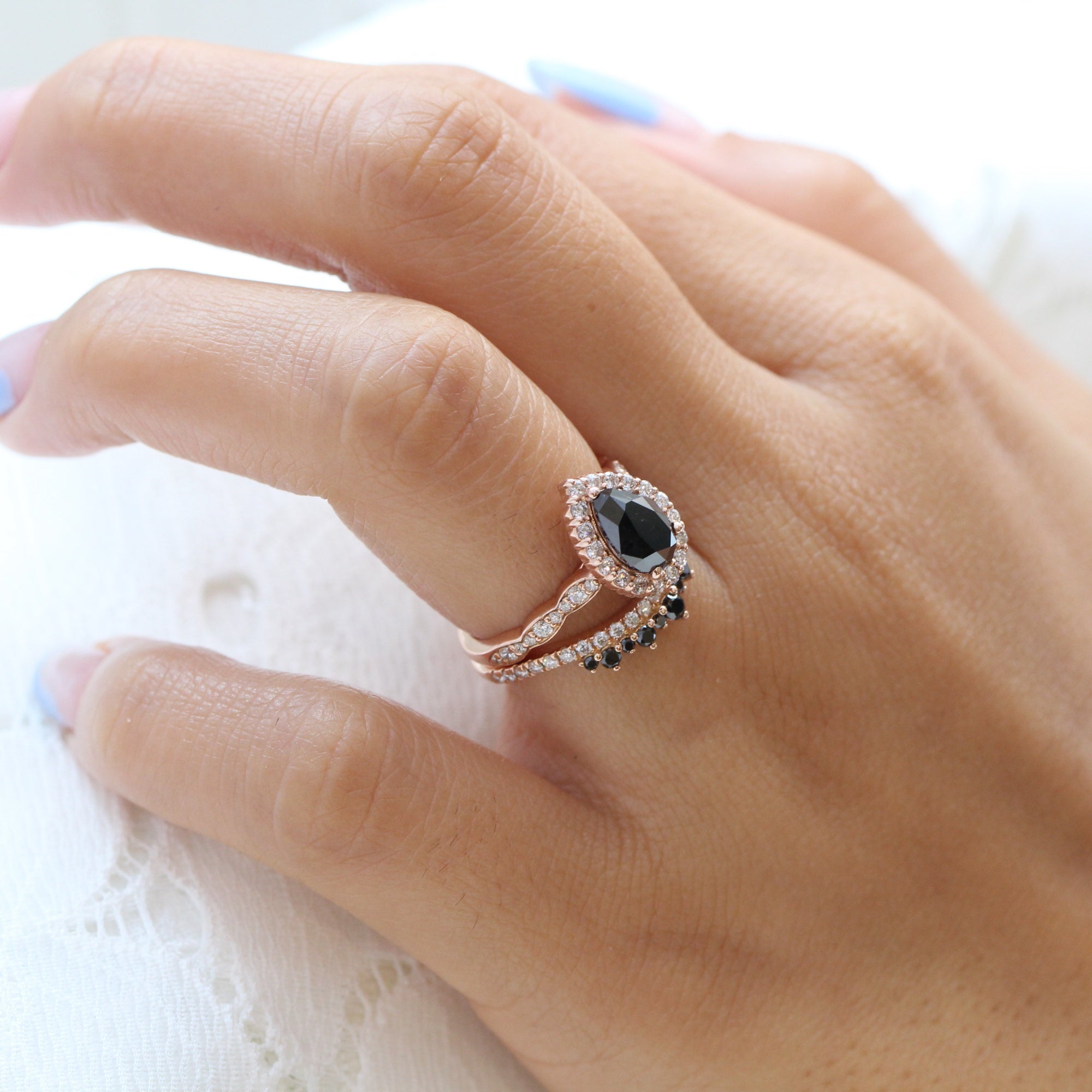Pear black diamond engagement ring bridal set rose gold crown diamond wedding band by la more design jewelry
