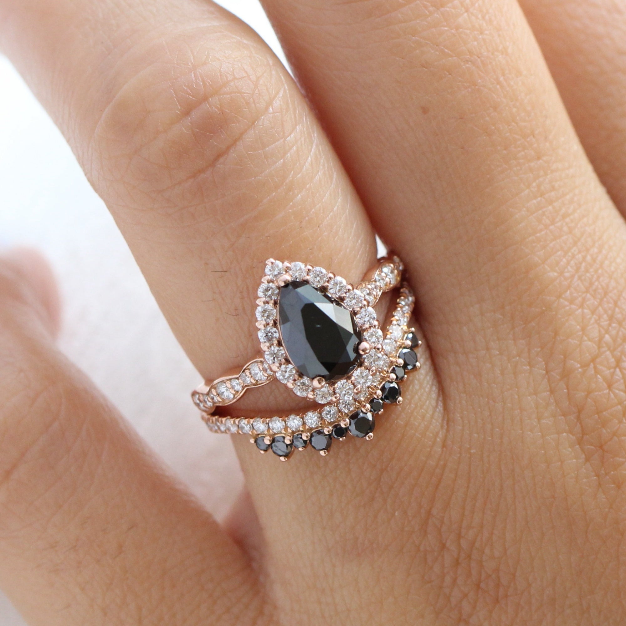 Pear black diamond engagement ring bridal set rose gold crown diamond wedding band by la more design jewelry