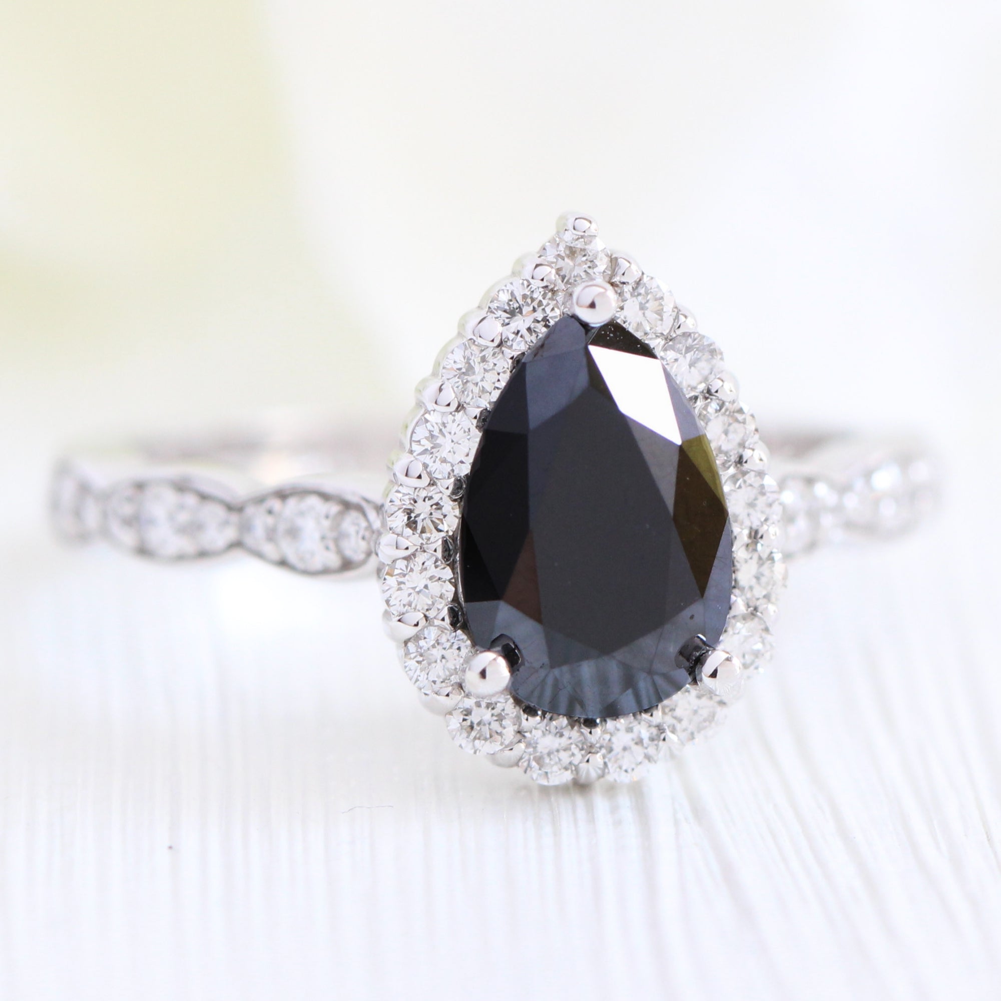 Pear black diamond engagement ring white gold halo diamond band by la more design jewelry