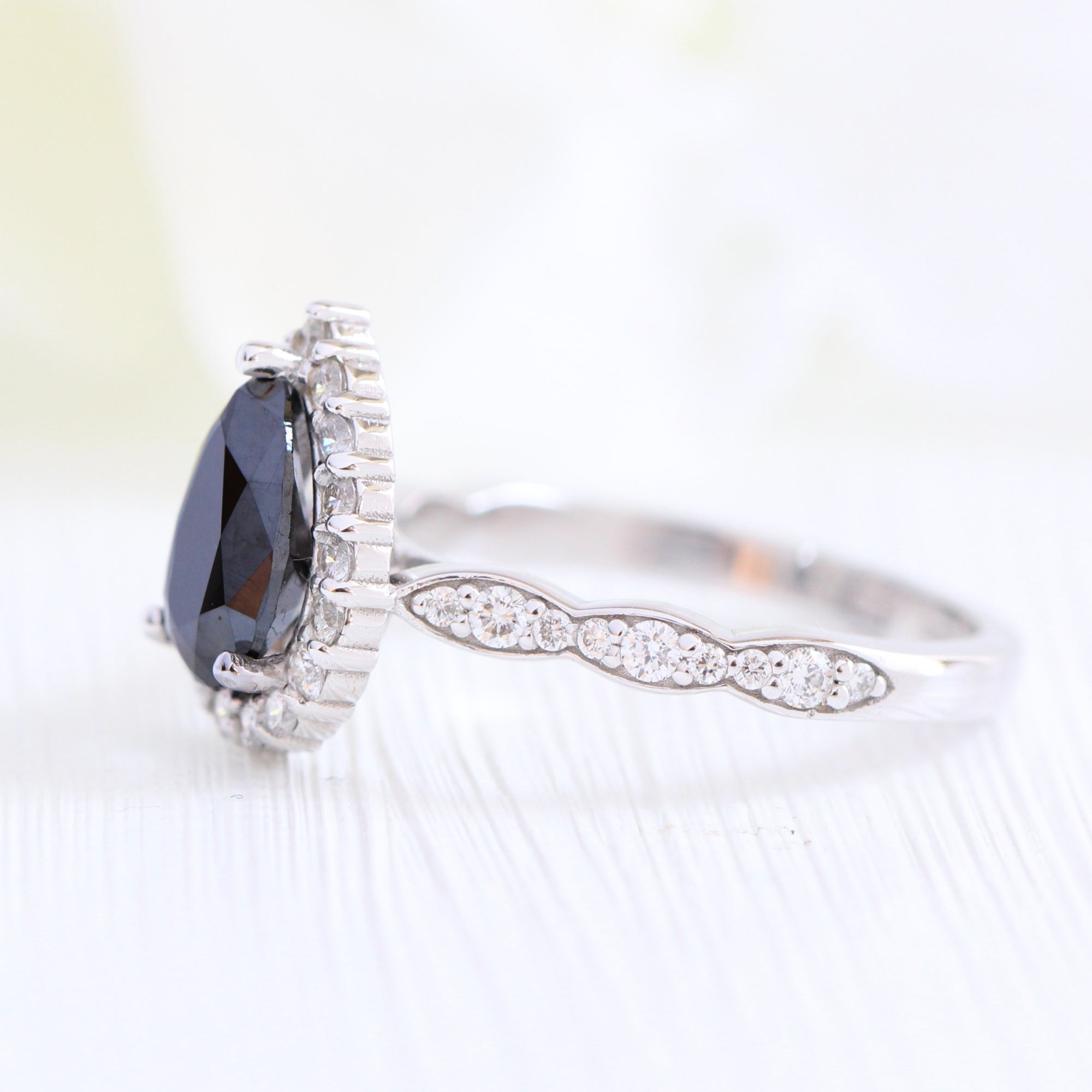 Pear black diamond engagement ring white gold halo diamond band by la more design jewelry