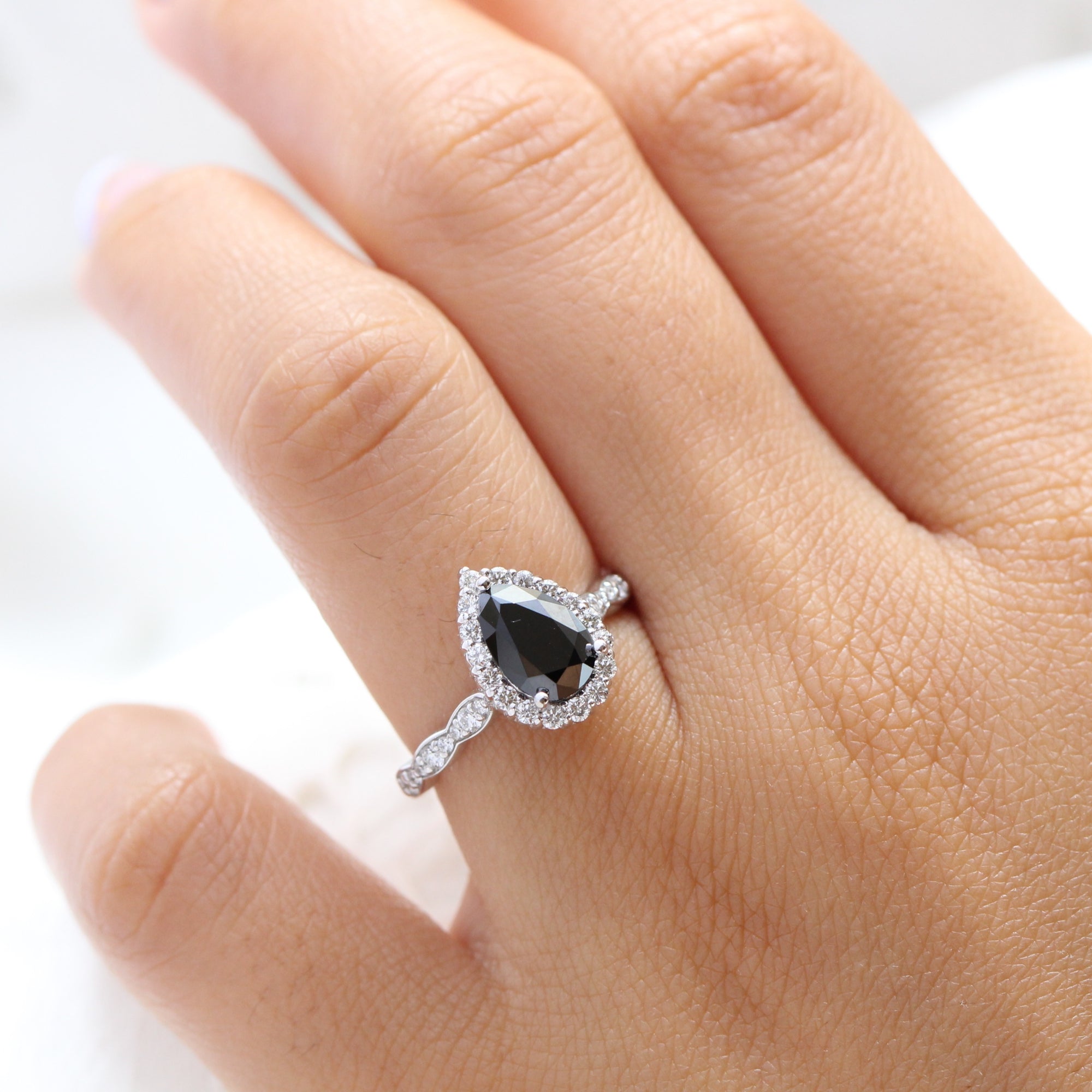 Pear black diamond engagement ring white gold halo diamond band by la more design jewelry