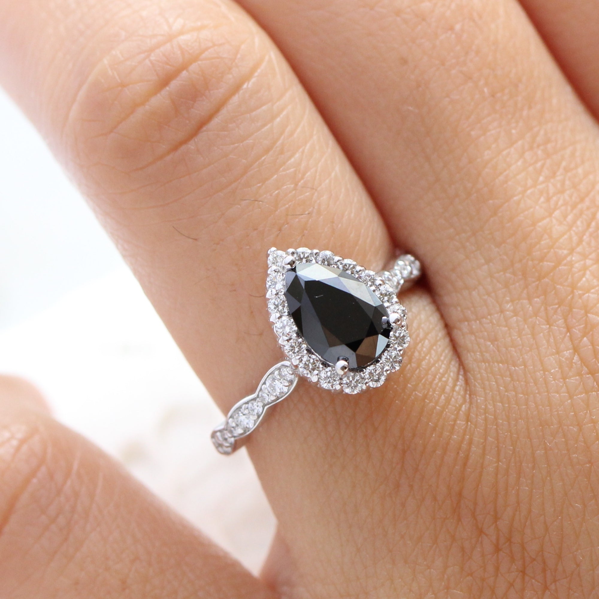 Pear black diamond engagement ring white gold halo diamond band by la more design jewelry