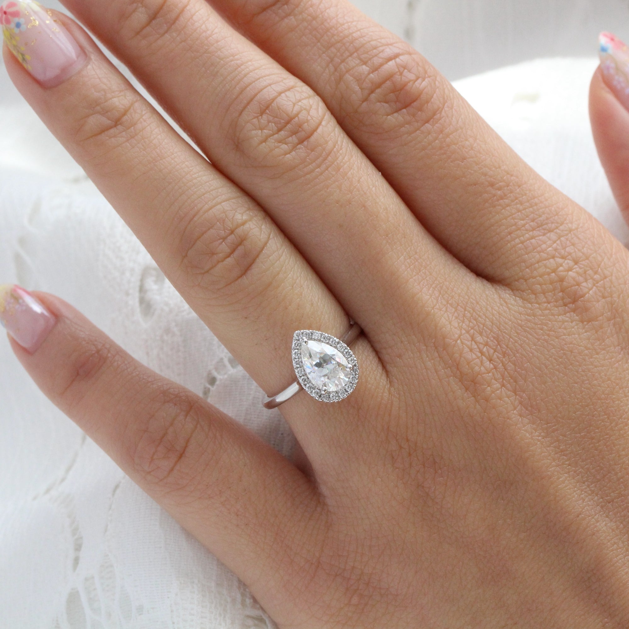 Pear cut moissanite engagement ring white gold halo diamond ring by la more design jewelry