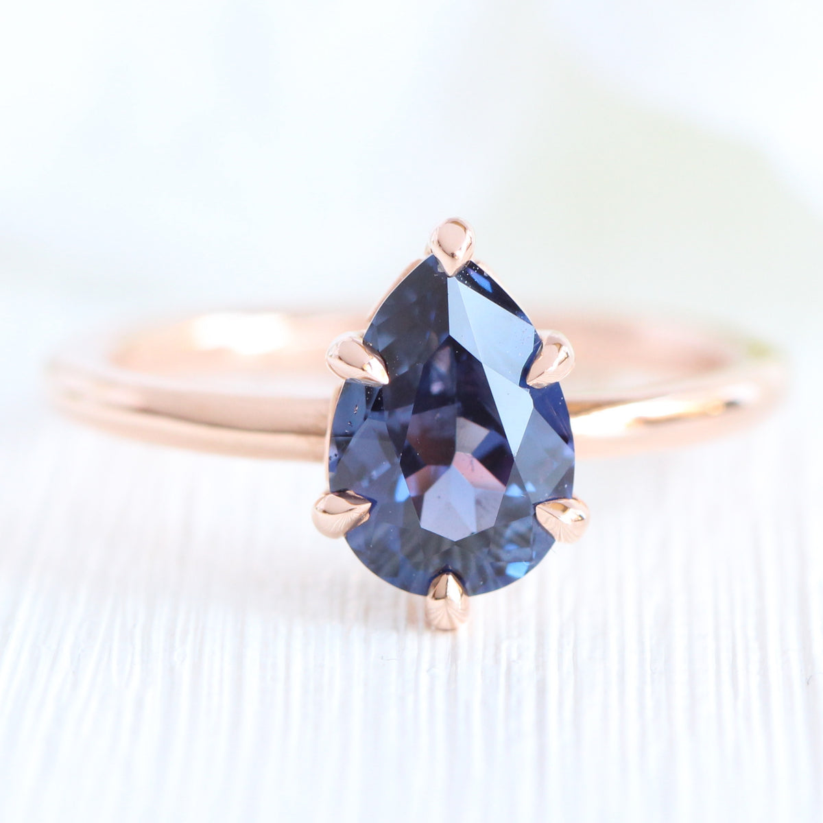 Pear cut purple blue sapphire ring rose gold low setting solitaire engagement ring la more design jewelry