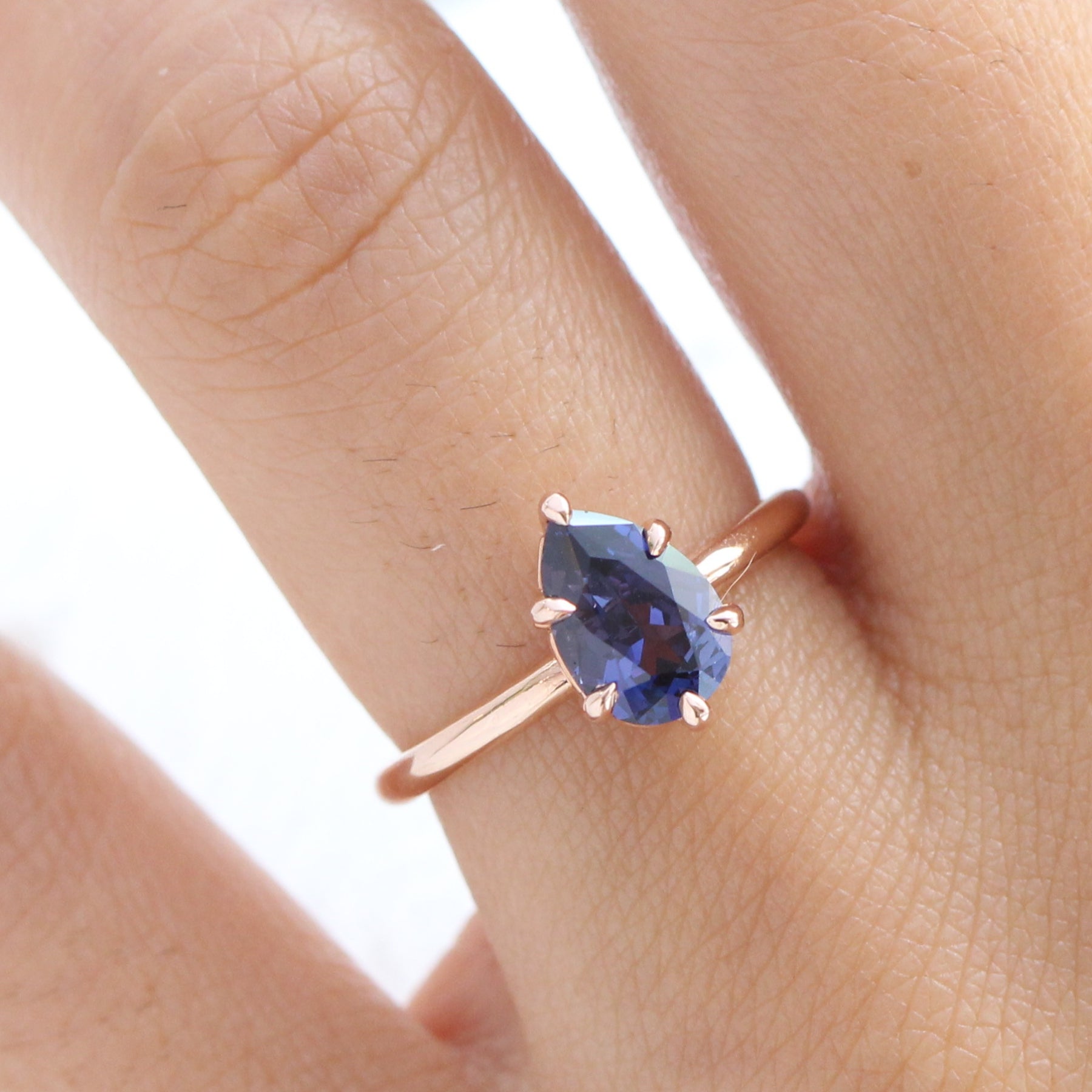 Pear cut purple blue sapphire ring rose gold low setting solitaire engagement ring la more design jewelry