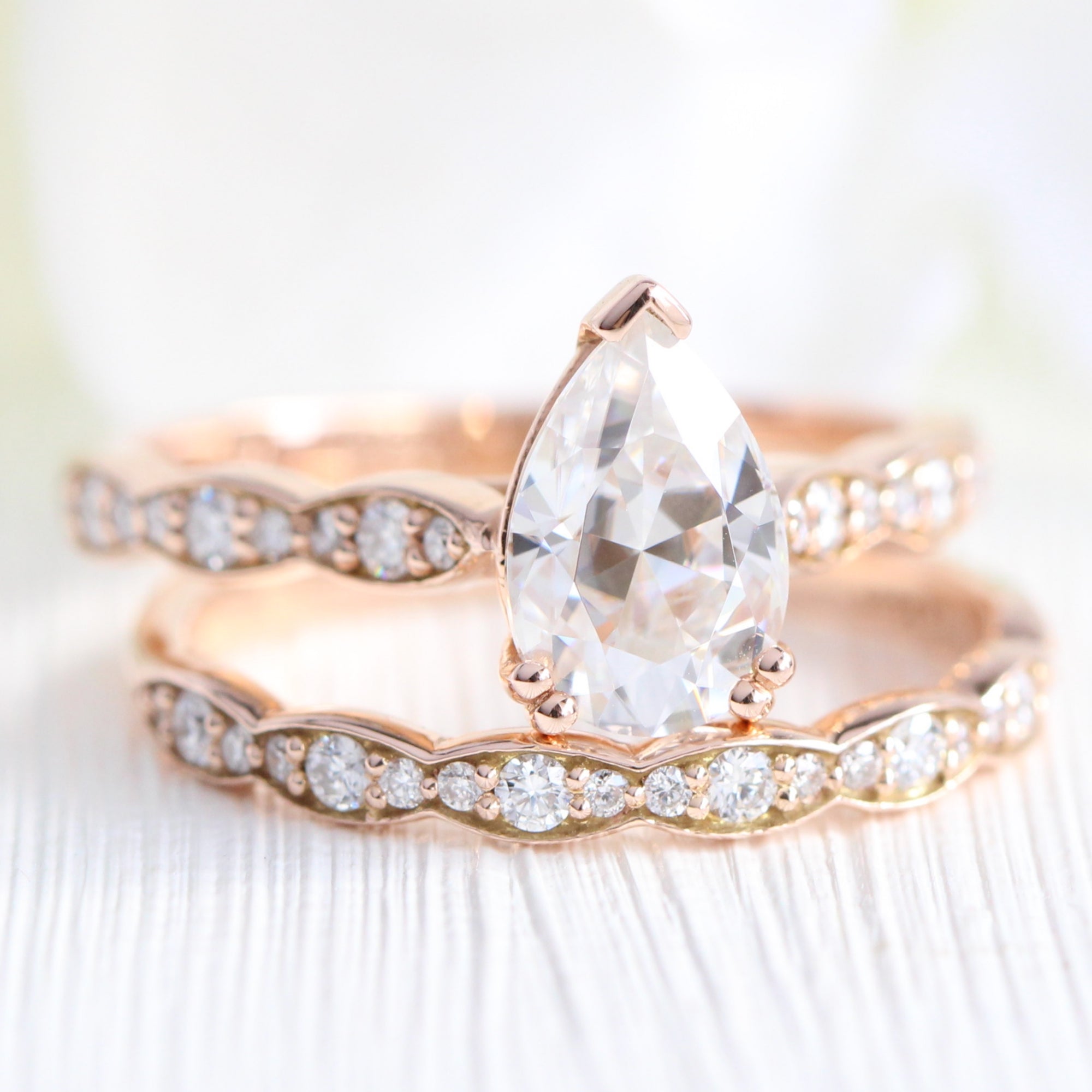 Pear moissanite diamond solitaire ring rose gold matching diamond wedding band la more design jewelry