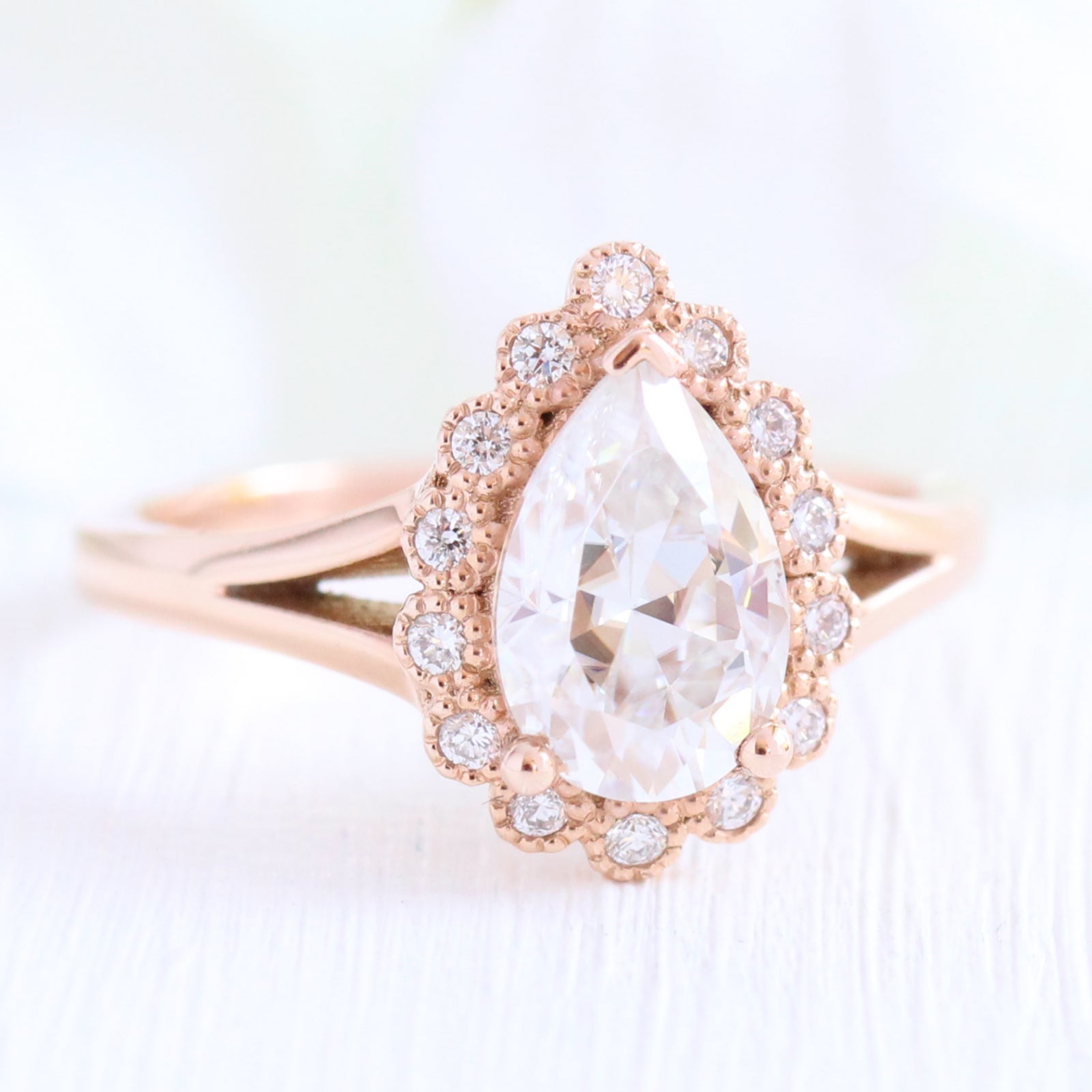 Pear moissanite engagement ring in rose gold vintage inspired diamond band by la more design jewelry