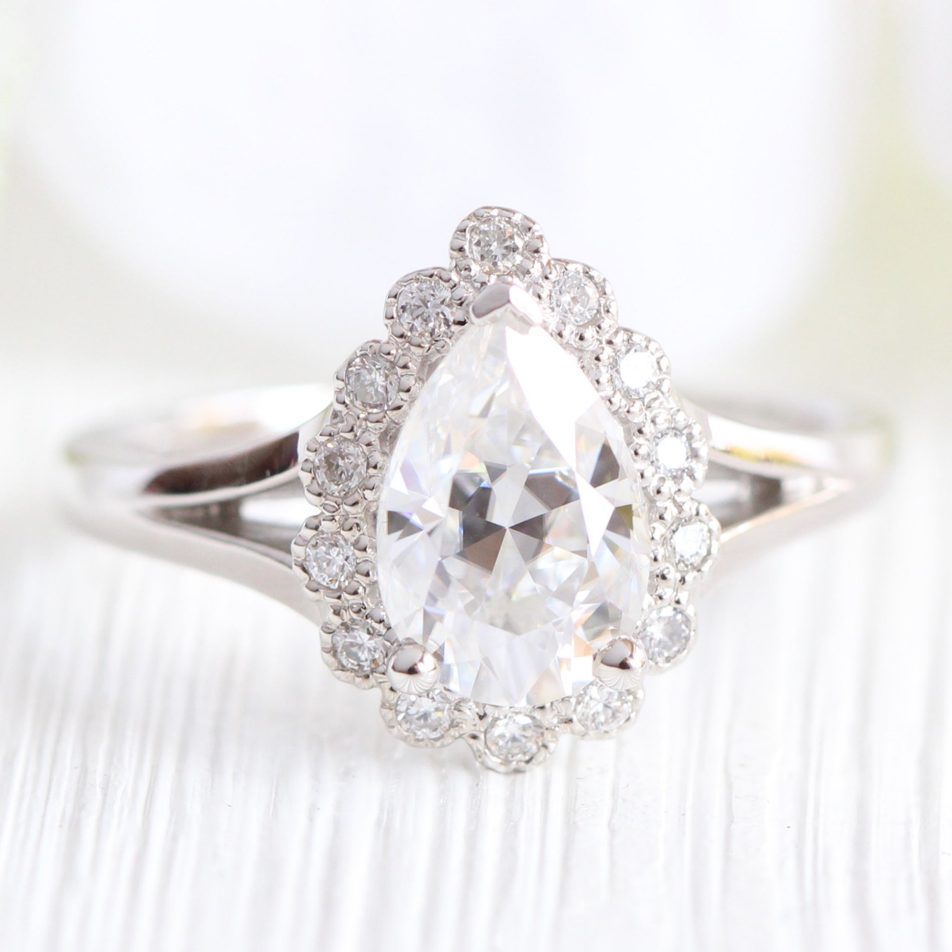 Pear moissanite engagement ring in white gold vintage inspired diamond band by la more design jewelry