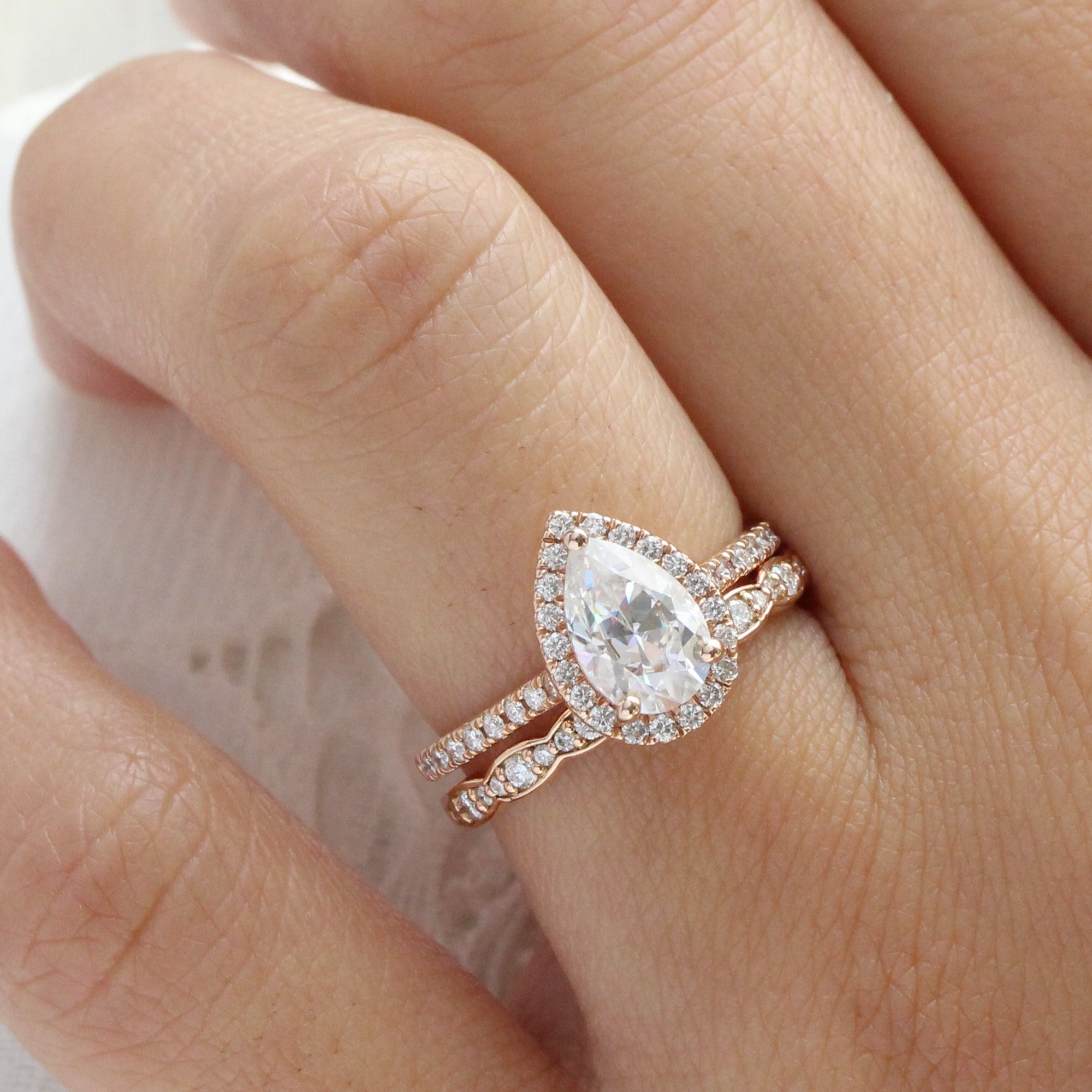 Pear moissanite engagement ring rose gold halo diamond bridal set la more design jewelry