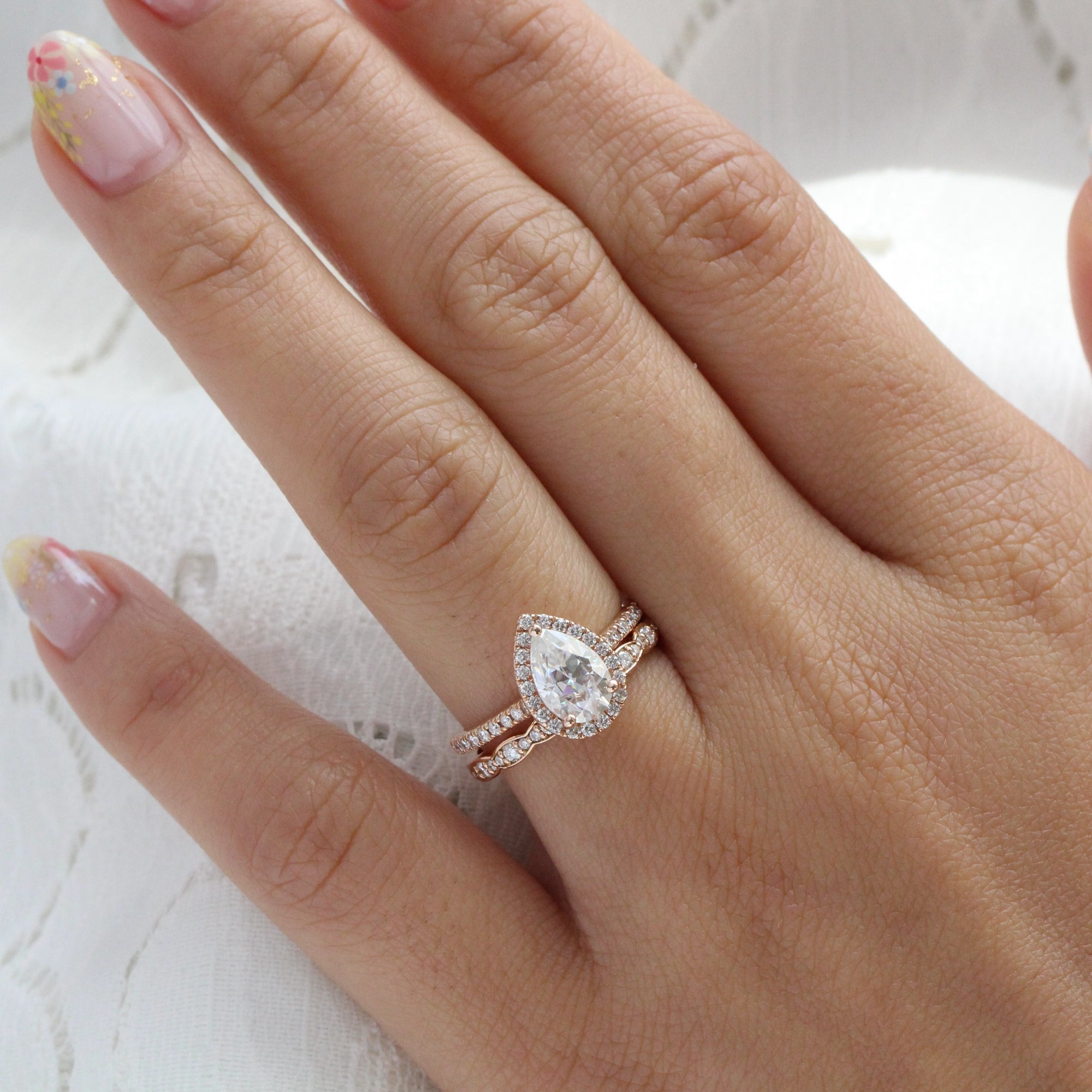 Pear moissanite engagement ring rose gold halo diamond bridal set la more design jewelry