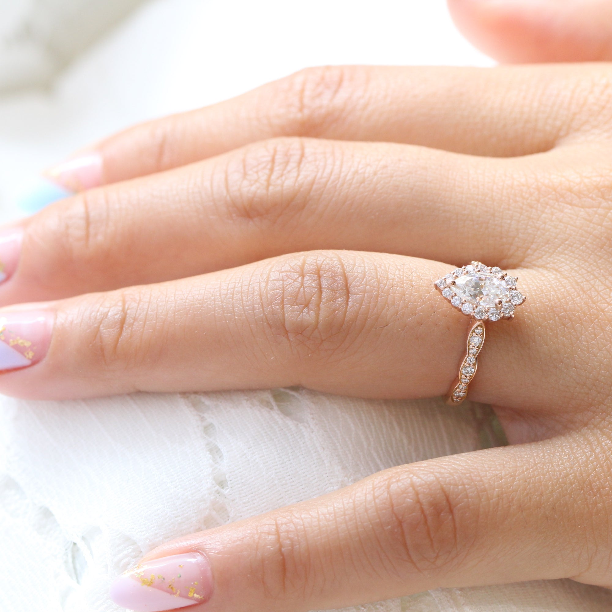 Pear moissanite engagement ring rose gold halo diamond ring la more design jewelry