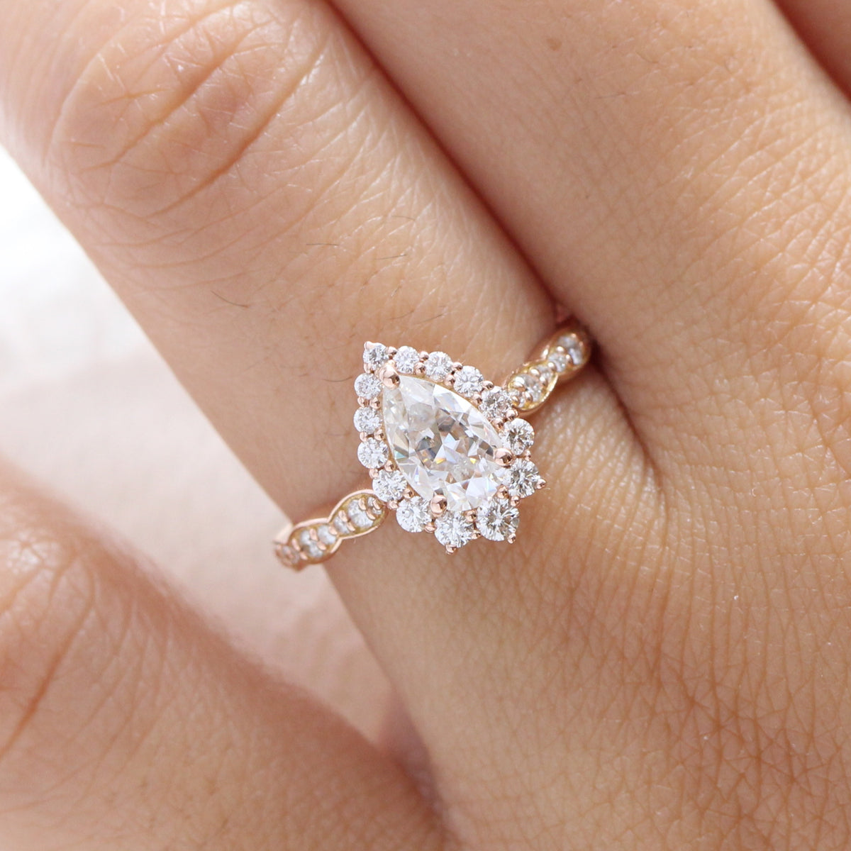 Pear moissanite engagement ring rose gold halo diamond ring la more design jewelry