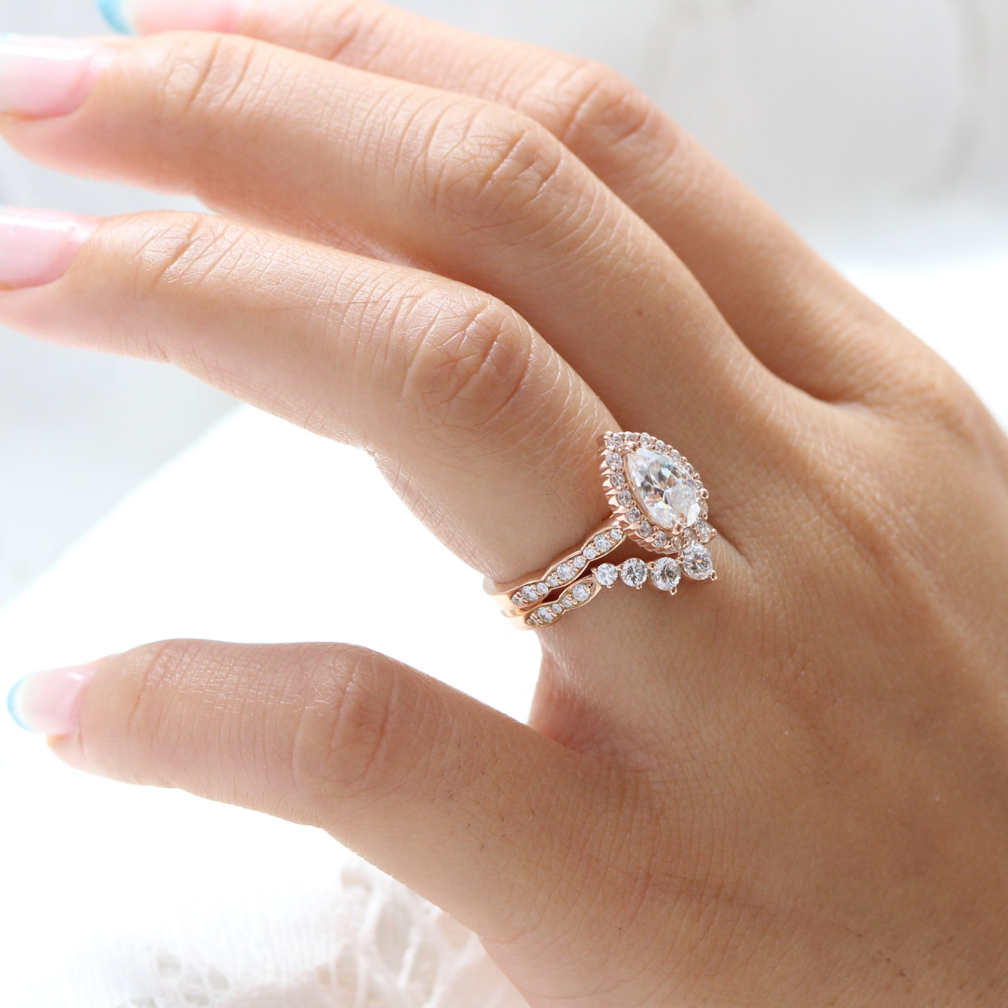 Pear moissanite ring rose gold large 7 diamond u shaped wedding band stacking rings la more design jewelry