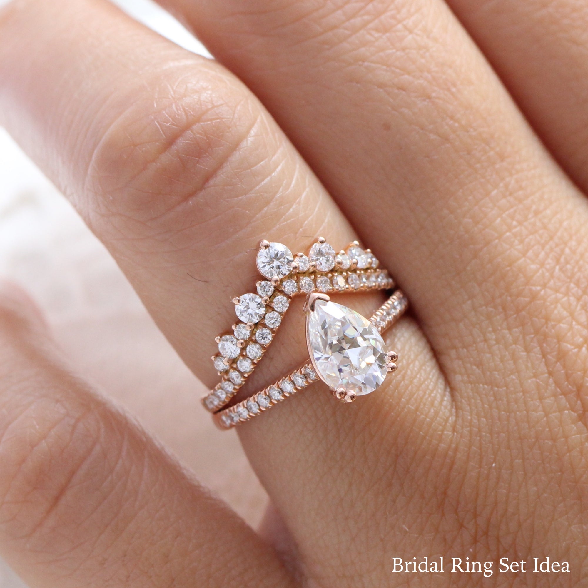 Pear moissanite solitaire ring rose gold curved diamond wedding ring set la more design jewelry