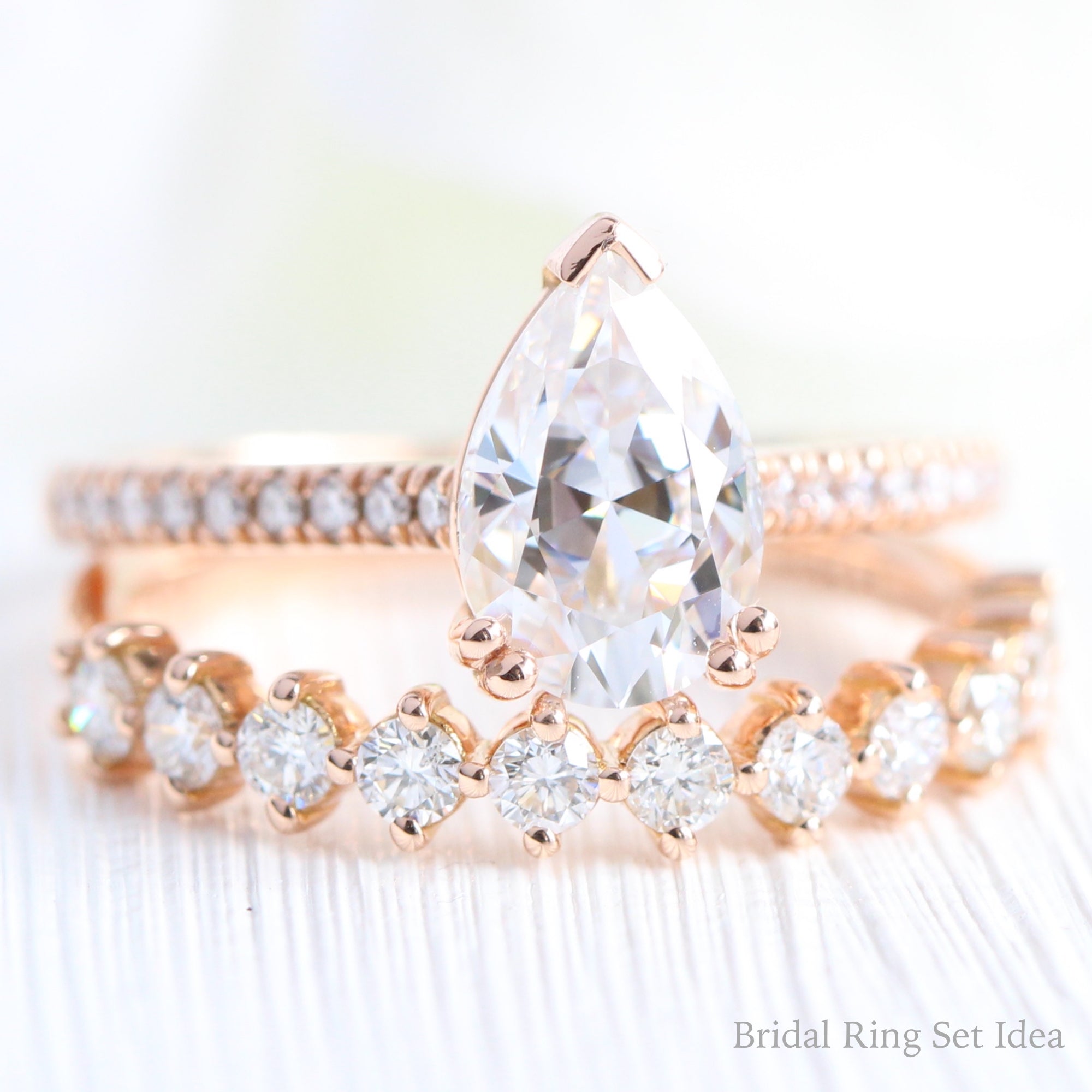 Pear moissanite solitaire ring rose gold matching diamond wedding ring set la more design jewelry