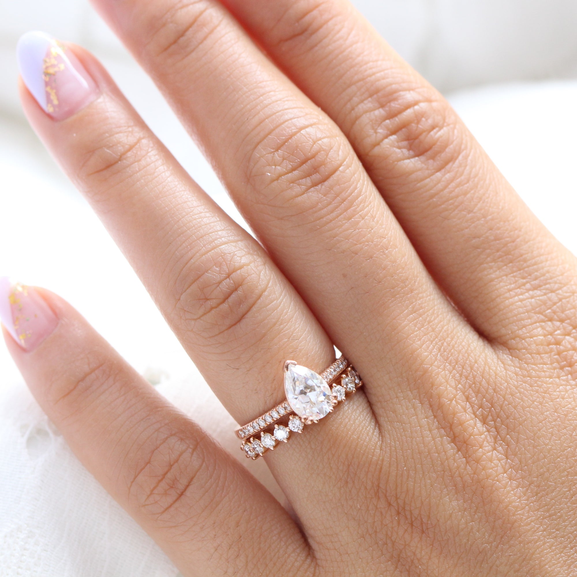 Pear moissanite solitaire ring rose gold matching diamond wedding ring set la more design jewelry