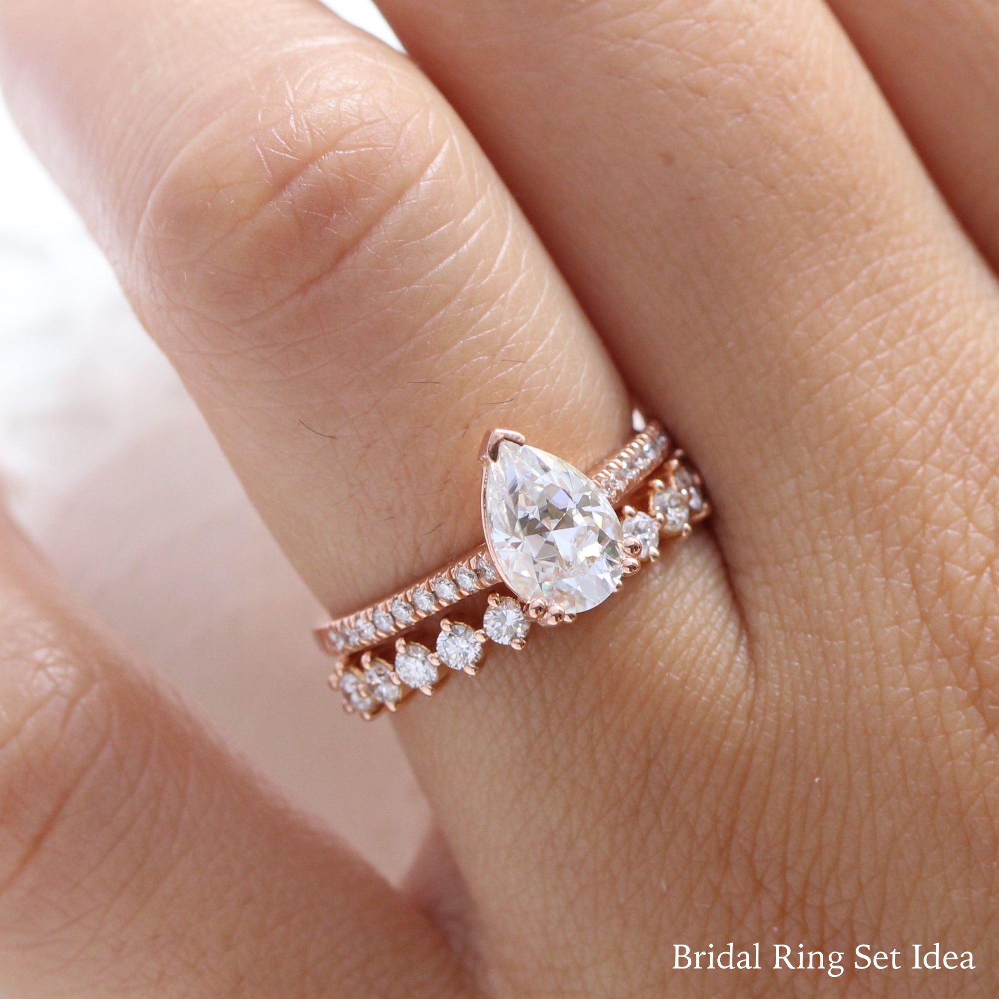 Pear moissanite solitaire ring rose gold matching diamond wedding ring set la more design jewelry