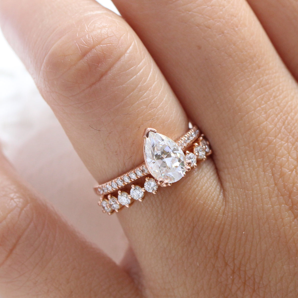Pear moissanite solitaire ring rose gold matching diamond wedding ring set la more design jewelry