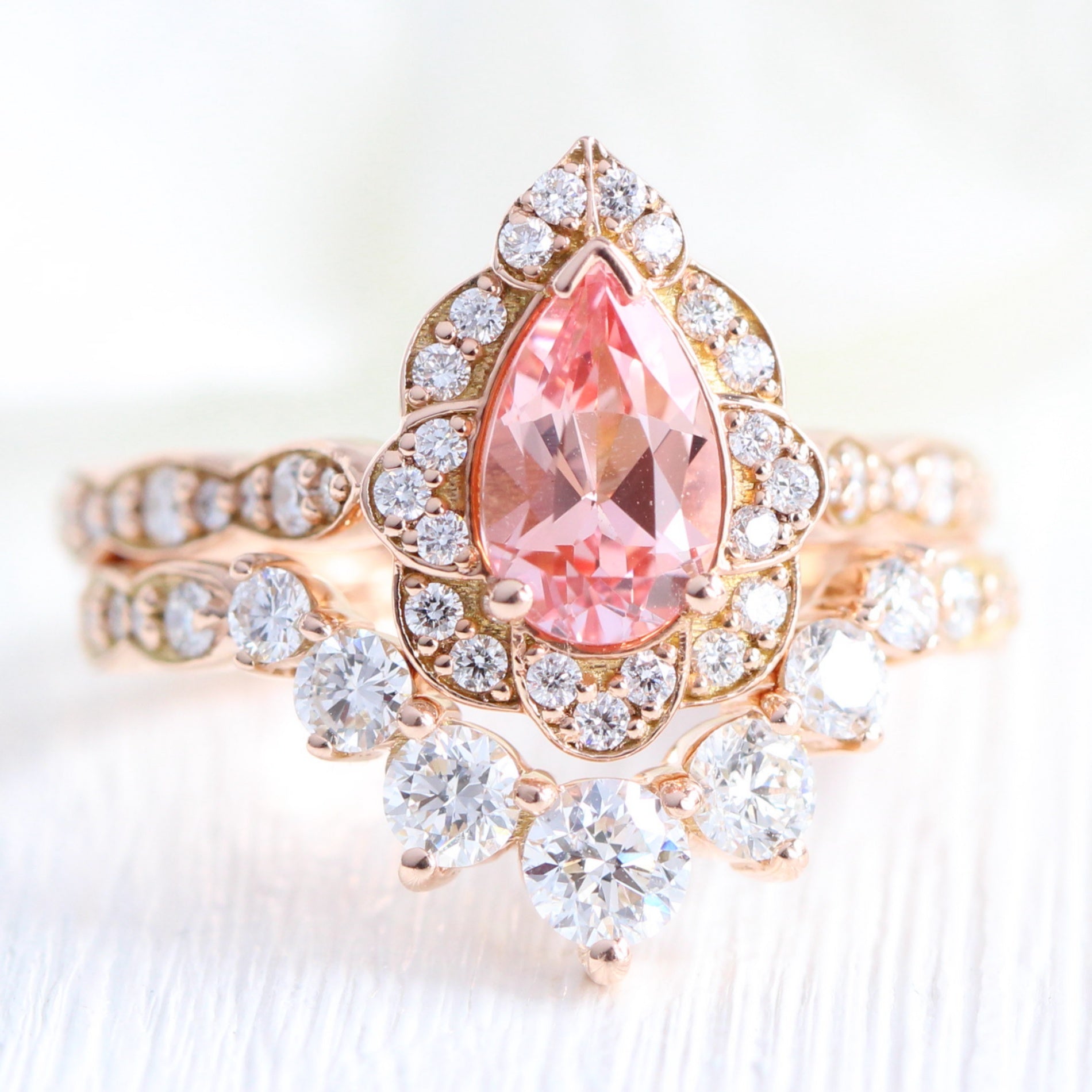 Pear peach sapphire engagement ring rose gold vintage halo diamond ring stack by la more design jewelry