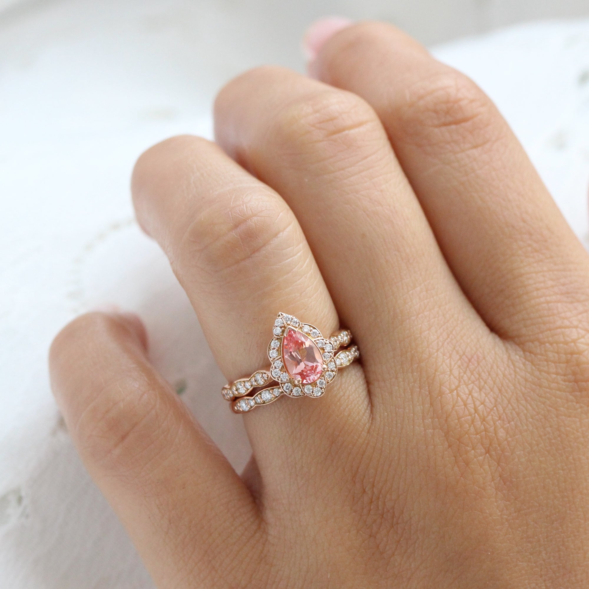 Pear peach sapphire engagement ring stack rose gold vintage halo diamond sapphire ring la more design jewelry