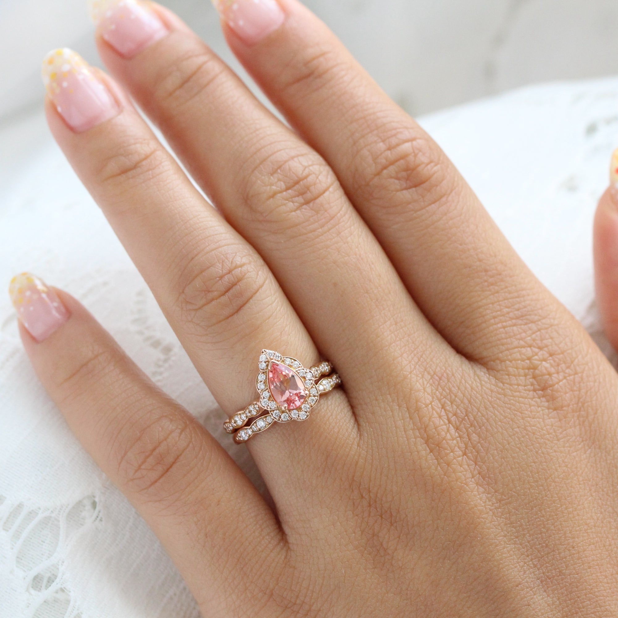 Pear peach sapphire engagement ring stack rose gold vintage halo diamond sapphire ring la more design jewelry