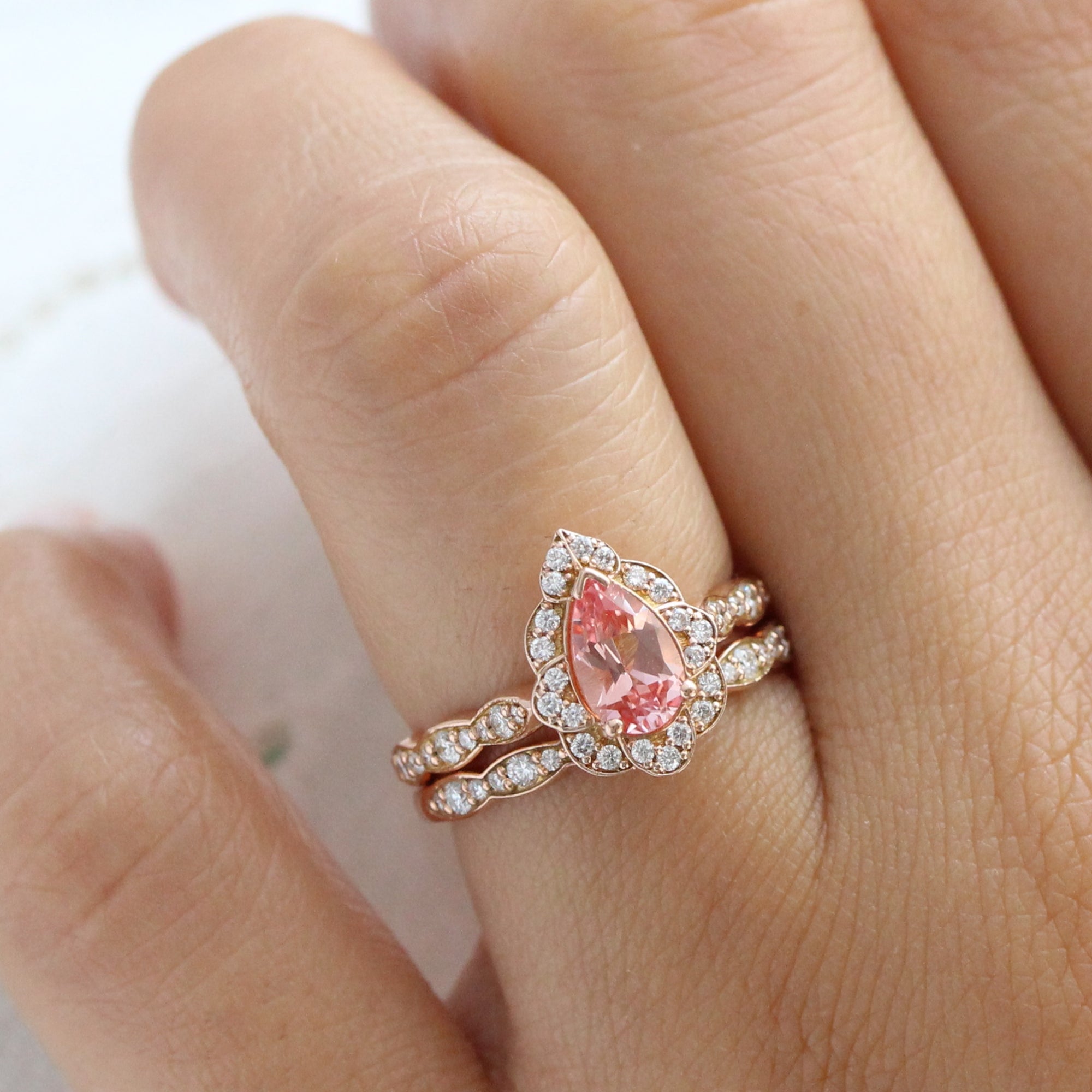Pear peach sapphire engagement ring stack rose gold vintage halo diamond sapphire ring la more design jewelry