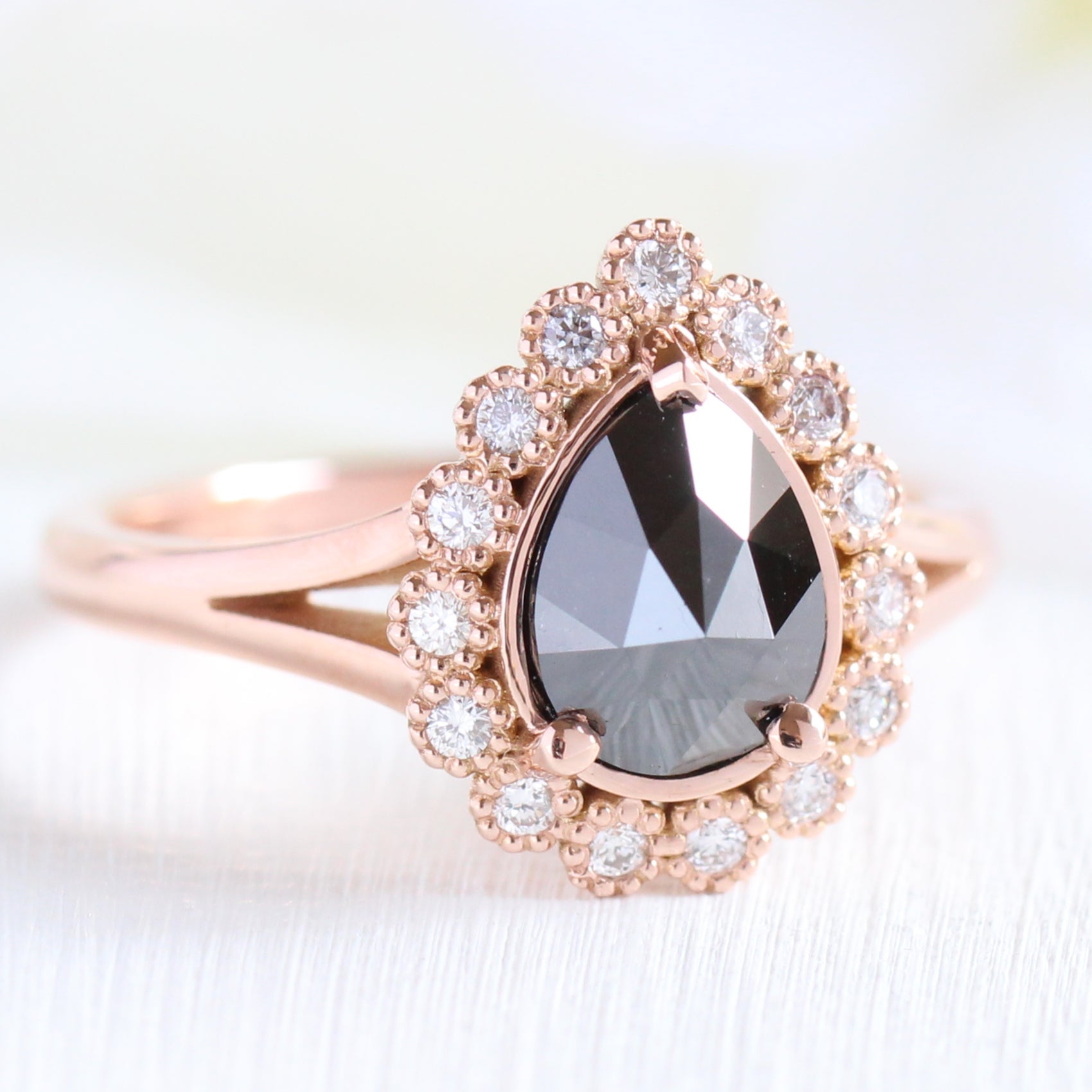 Pear rose cut black diamond engagement ring in rose gold halo diamond band by la more design jewelry
