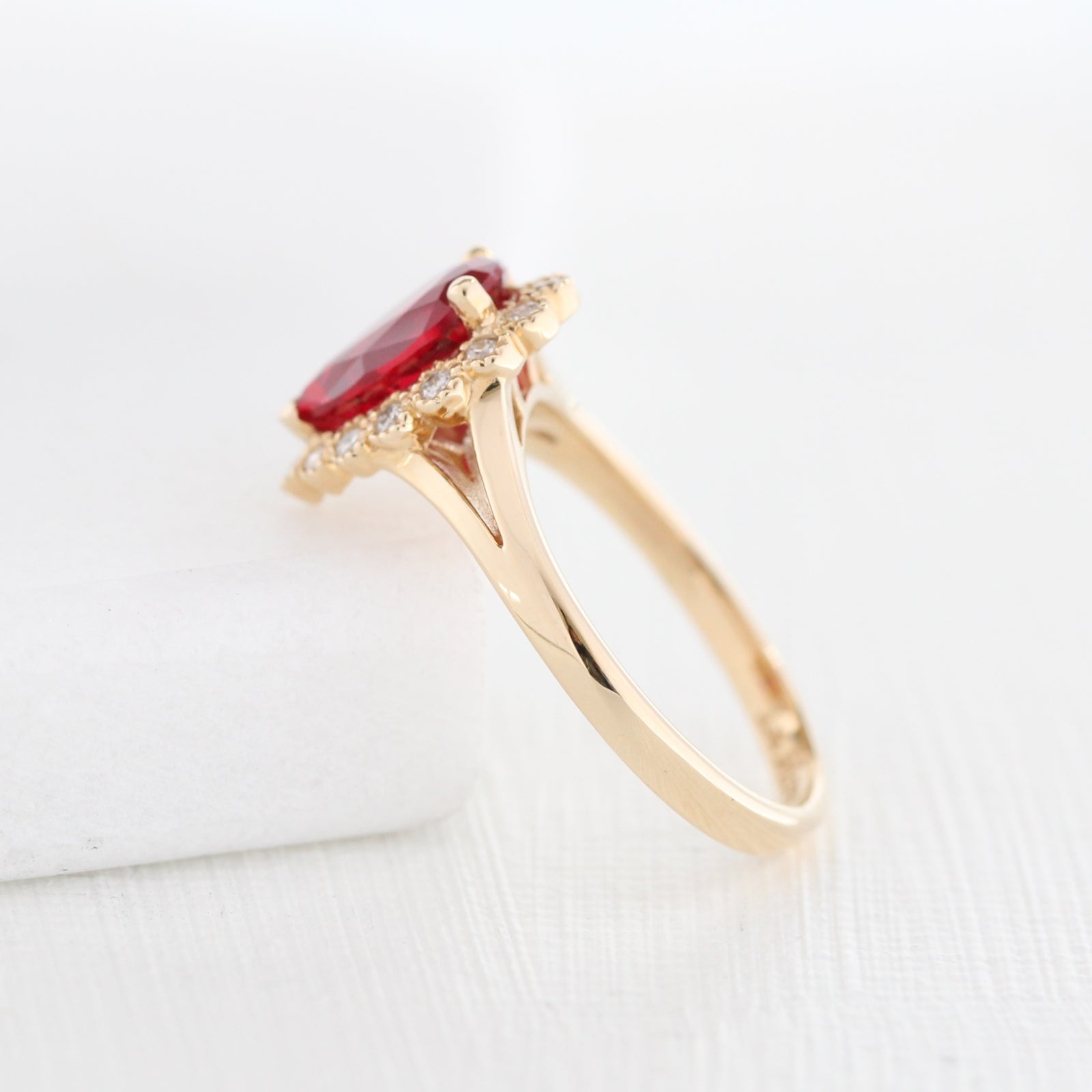 Pear ruby ring bridal set in yellow gold vintage inspired diamond band by la more design