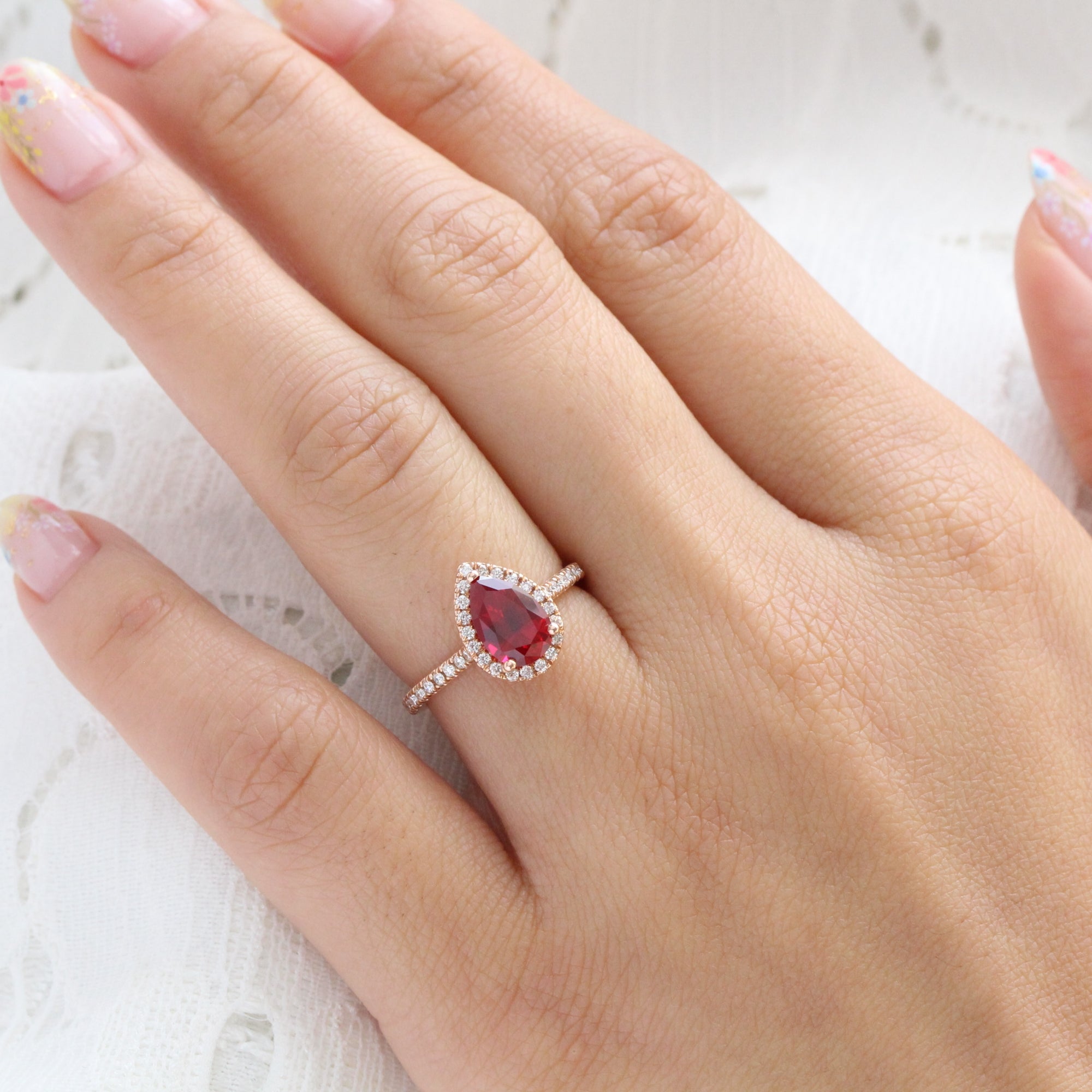 Pear ruby engagement ring rose gold halo diamond ruby ring la more design jewelry