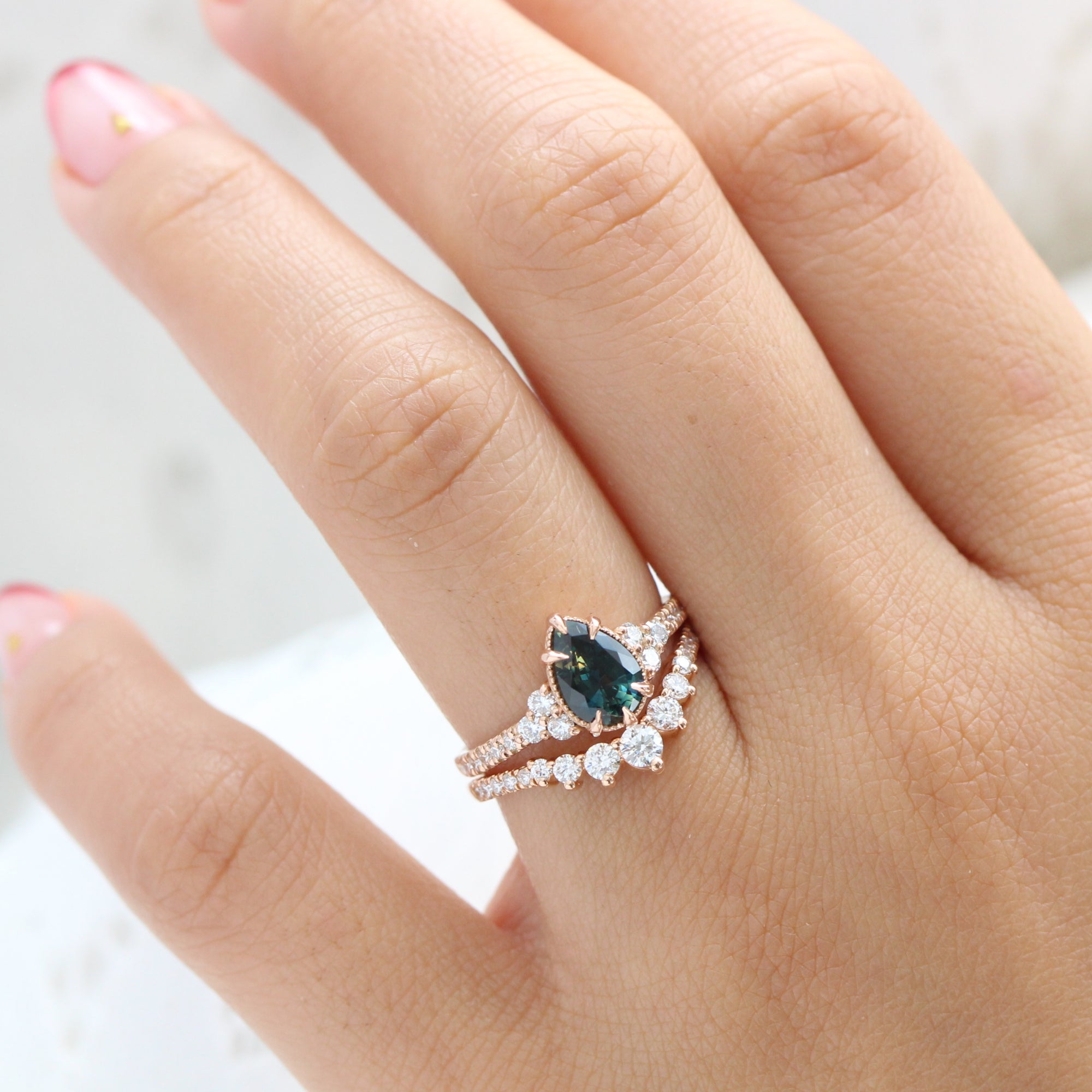 Three stone pear store ring