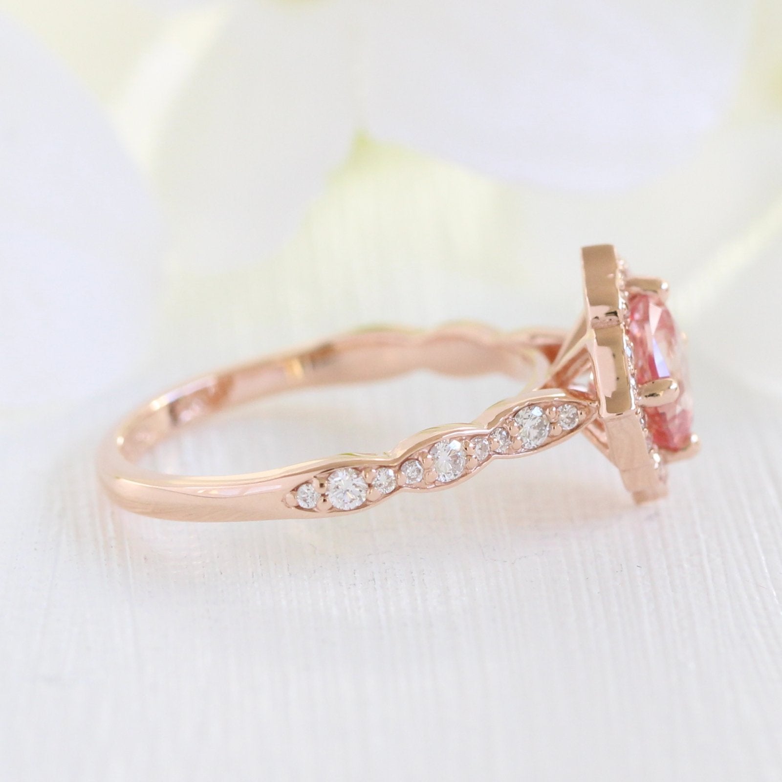vintage inspired peach sapphire engagement ring in rose gold diamond band by la more design