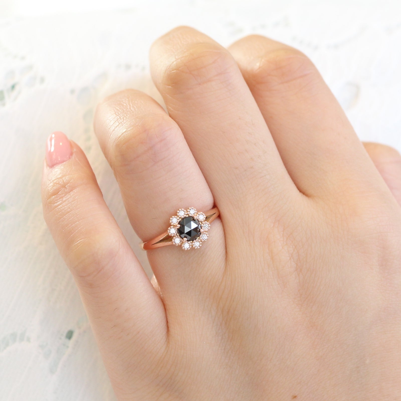 Rose cut black diamond ring in rose gold halo diamond band by la more design